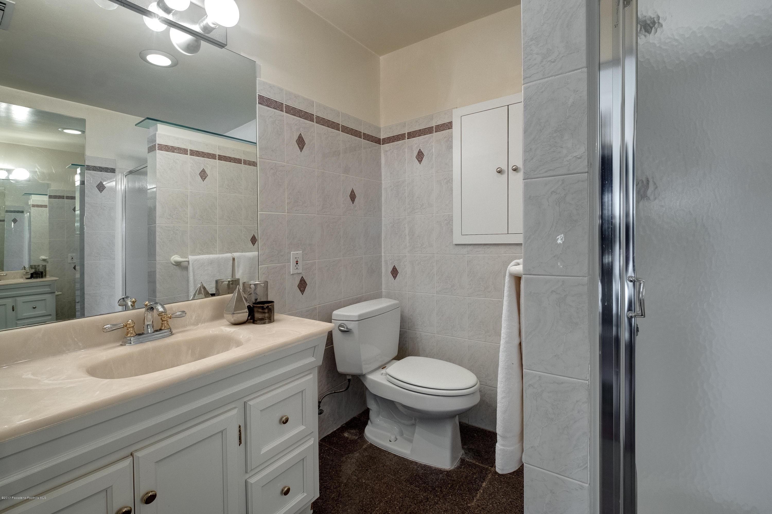 320 Patrician Way Pasadena, CA 91105 - Photo 26 of 69 a bathroom with a sink toilet and shower