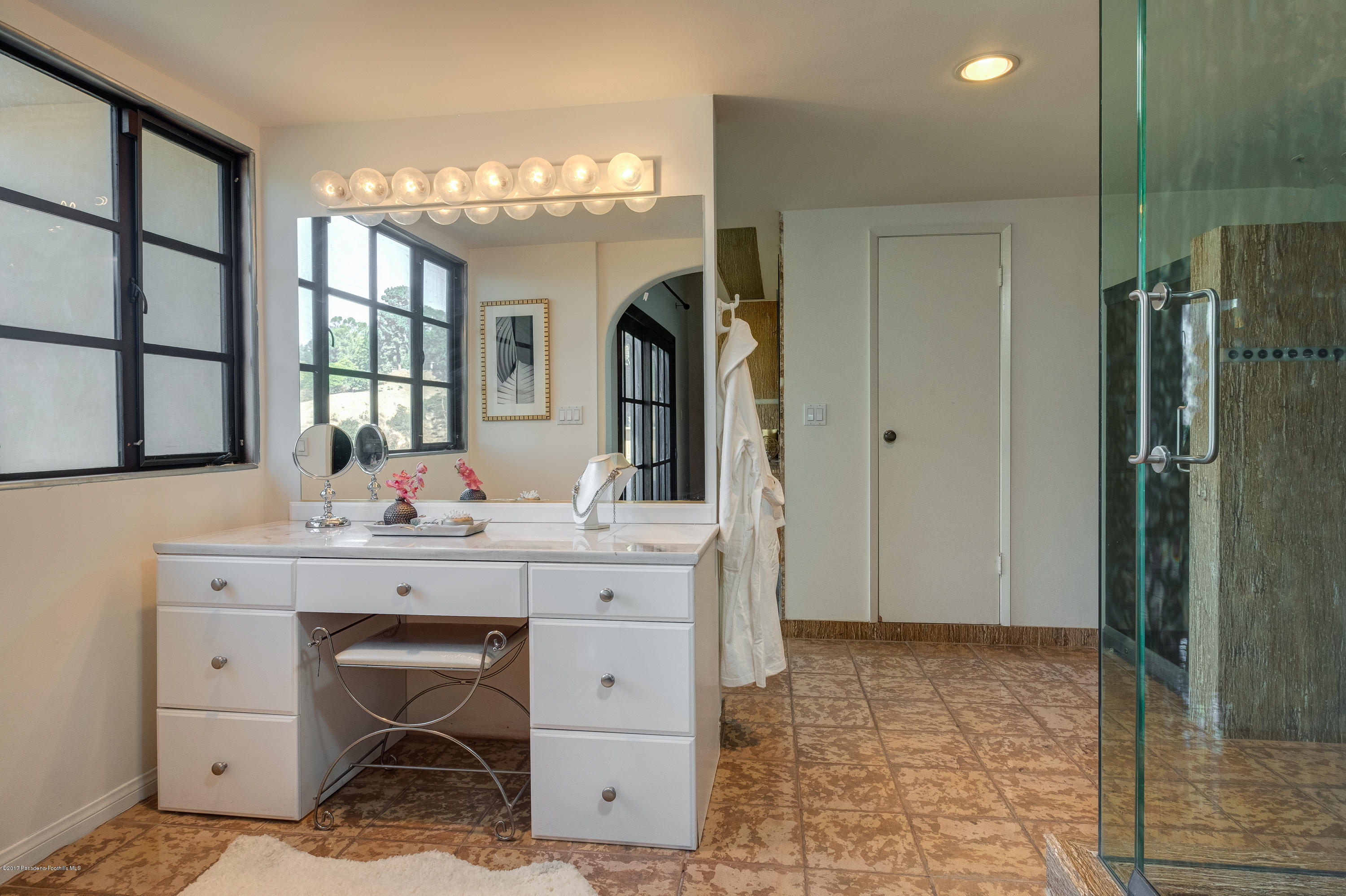 320 Patrician Way Pasadena, CA 91105 - Photo 28 of 69 a view of hall way with mirror and stairs