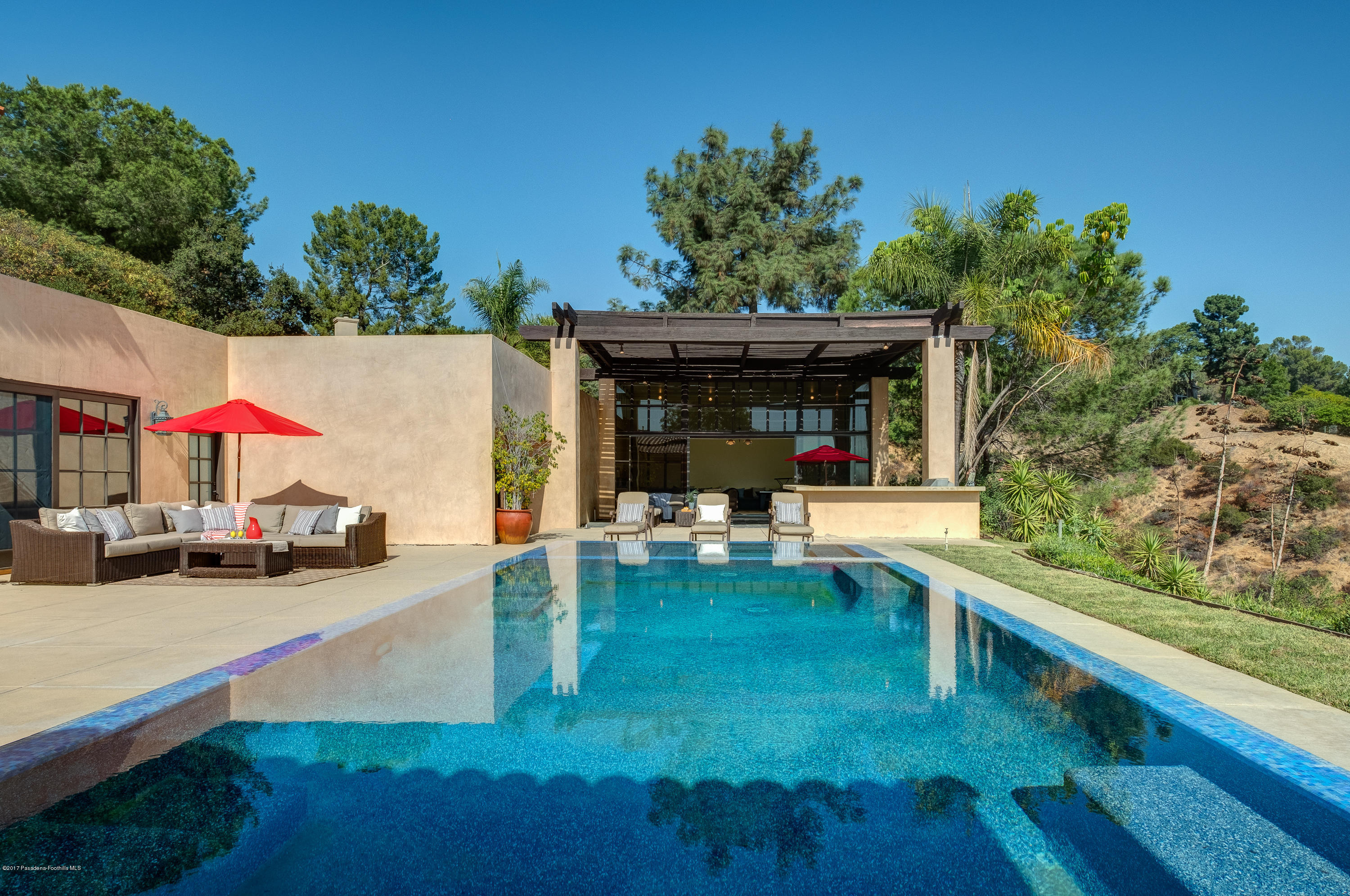 320 Patrician Way Pasadena, CA 91105 - Photo 49 of 69 a view of a house with backyard porch and sitting area