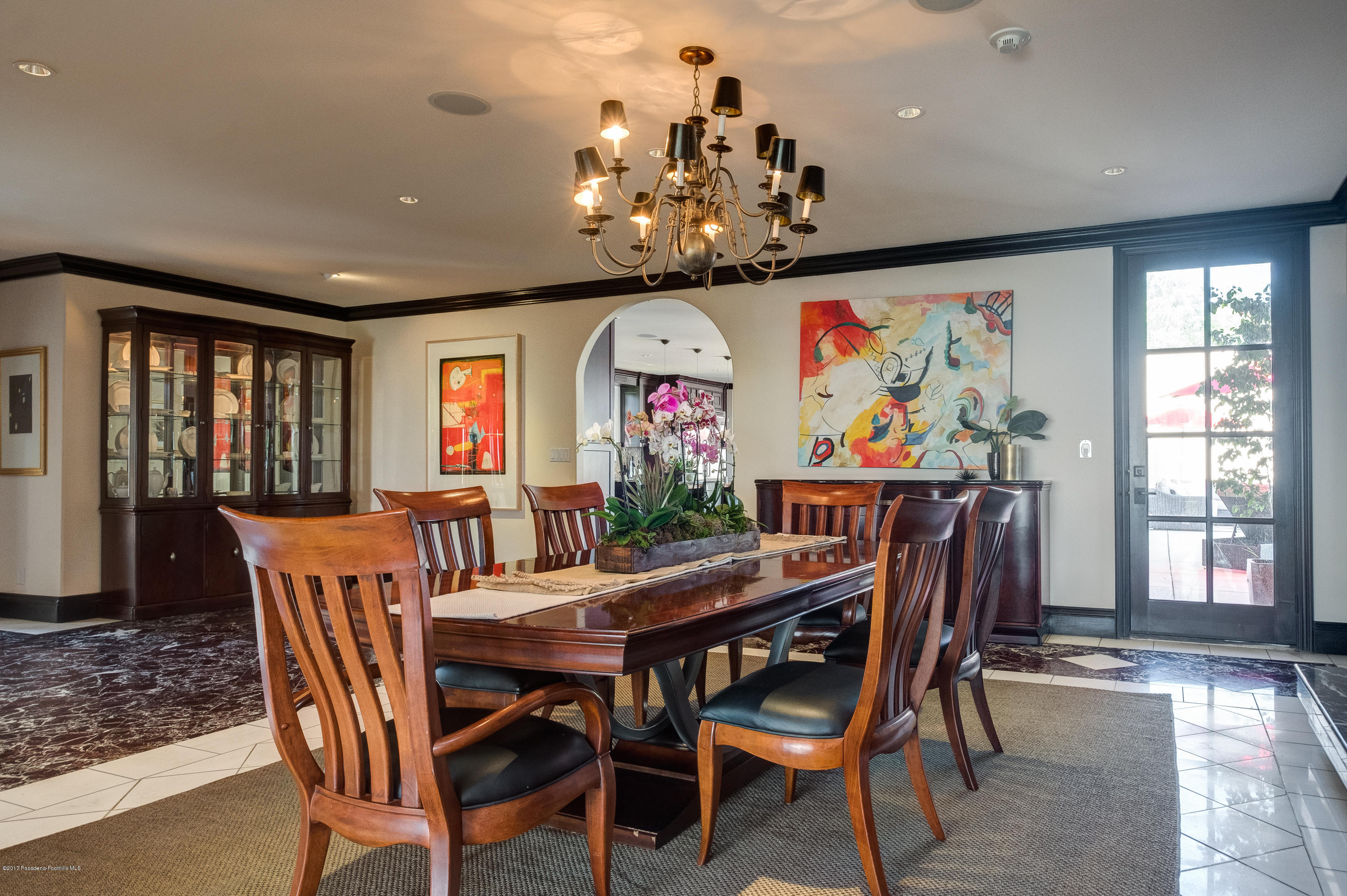 320 Patrician Way Pasadena, CA 91105 - Photo 6 of 69 a view of a dining room with furniture chandelier and wooden floor