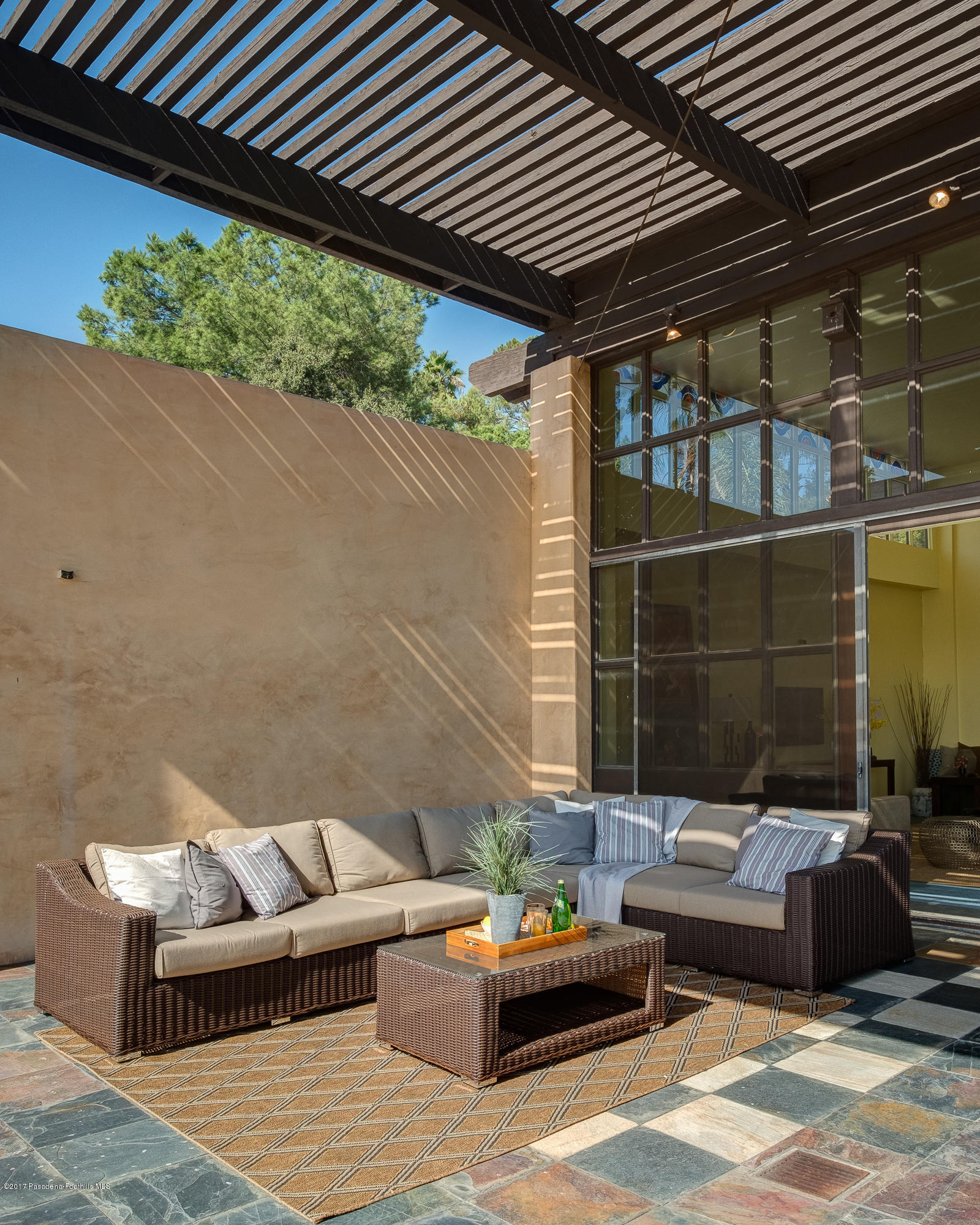 320 Patrician Way Pasadena, CA 91105 - Photo 52 of 69 a outdoor living space with furniture and umbrella