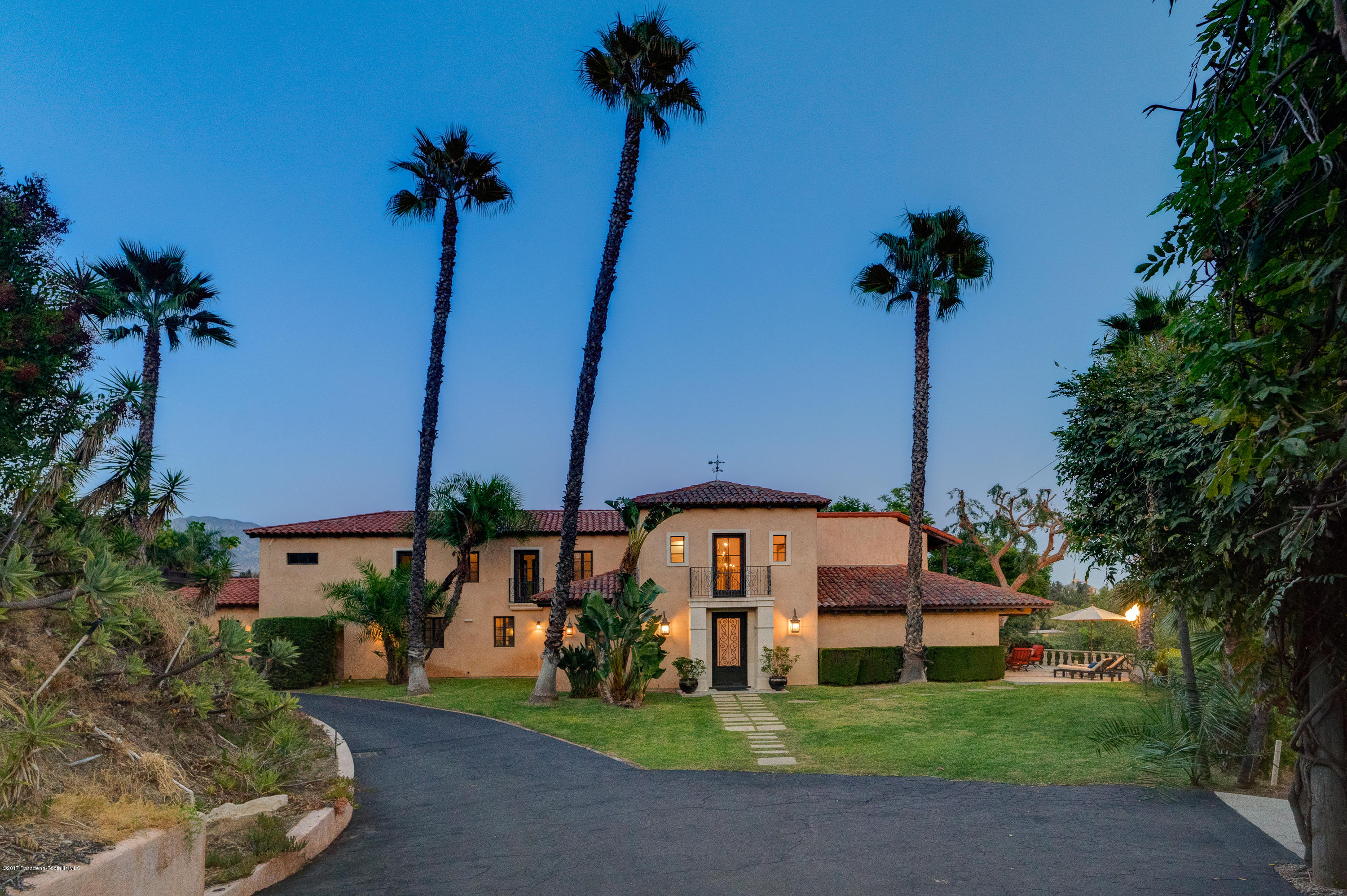320 Patrician Way Pasadena, CA 91105 - Photo 57 of 69 a front view of a house with garden