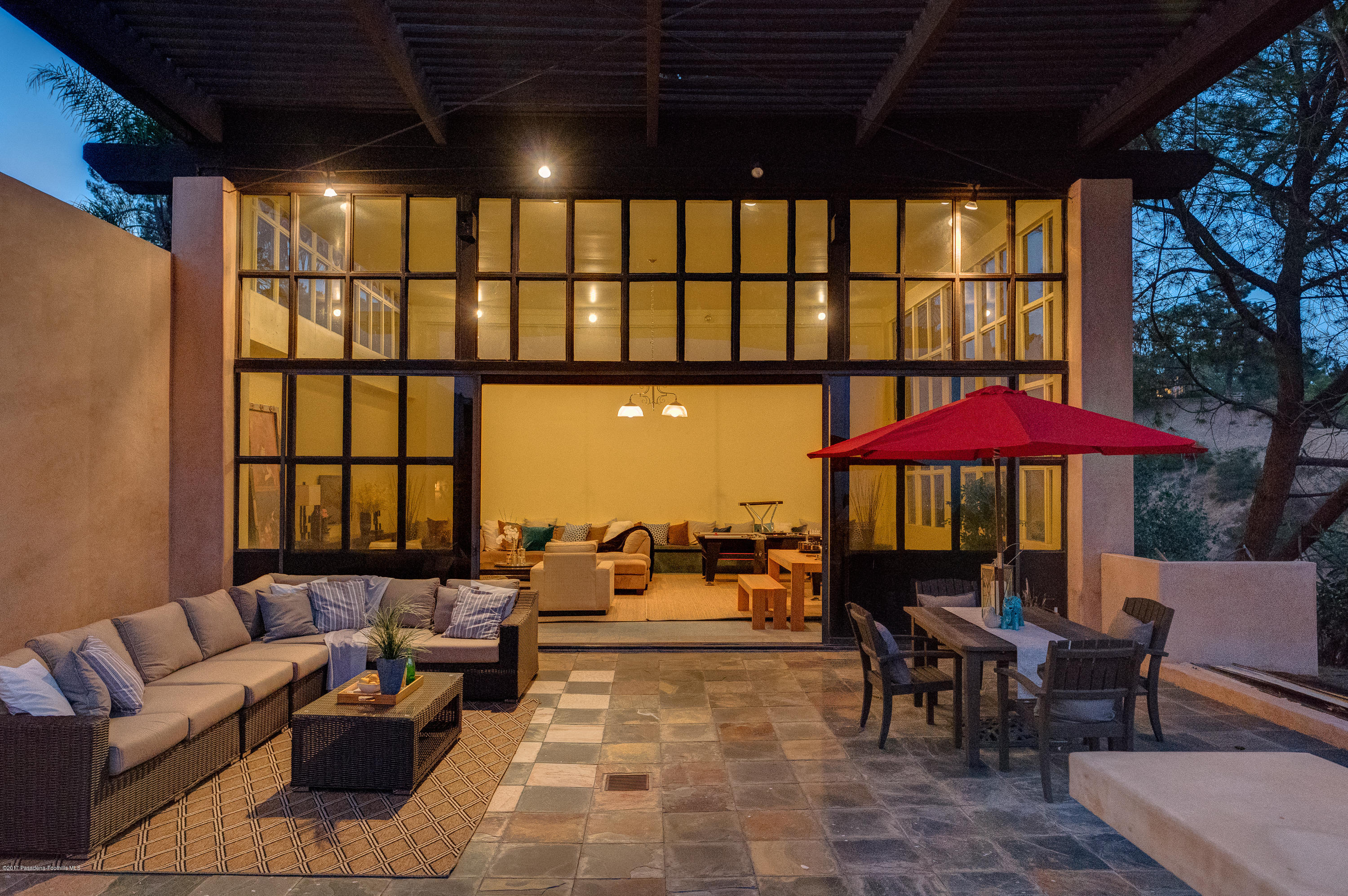 320 Patrician Way Pasadena, CA 91105 - Photo 69 of 69 a outdoor space with patio lots of furniture and umbrella