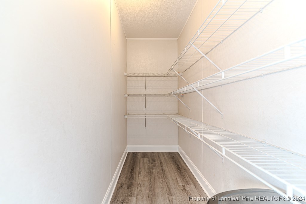 130 Box Elder Terrace Cameron, NC 28326 - Photo 17 of 43 a view of a room with racks on the wall