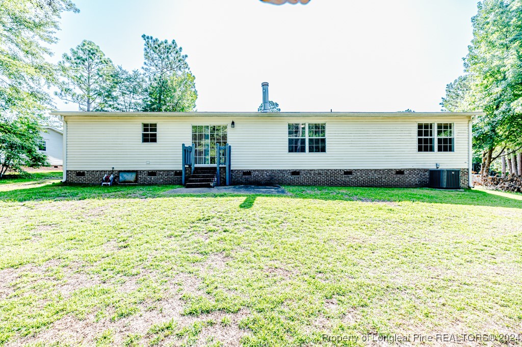 130 Box Elder Terrace Cameron, NC 28326 - Photo 36 of 43 front view of a house with a yard