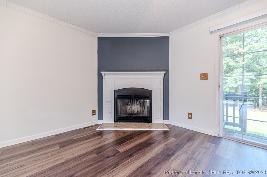 130 Box Elder Terrace Cameron, NC 28326 - Photo 6 of 43 a view of an empty room with wooden floor and a window