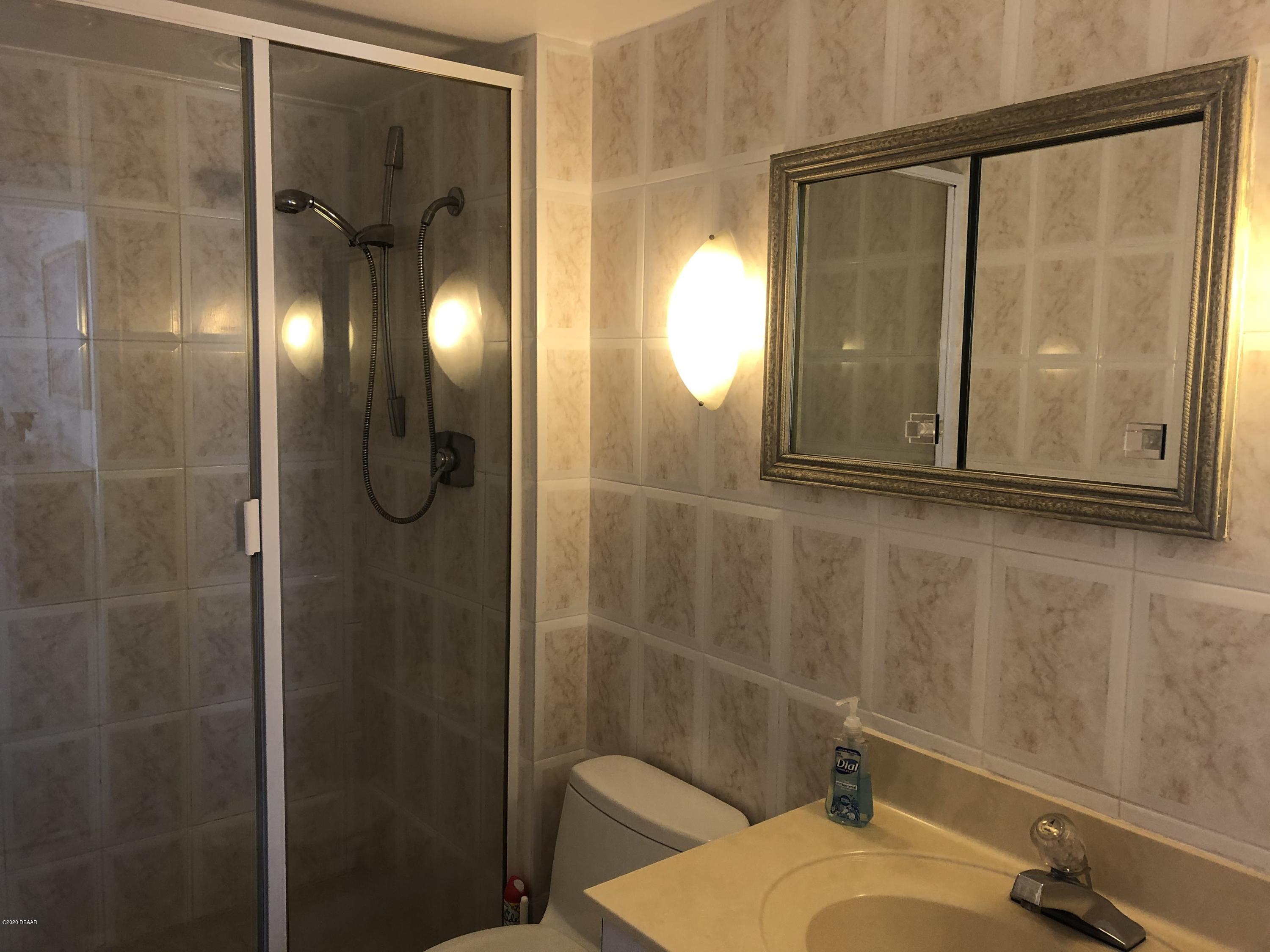 1575 Ocean Shore Boulevard, Unit 402 Ormond Beach, FL 32176 - Photo 13 of 21 Guest bath