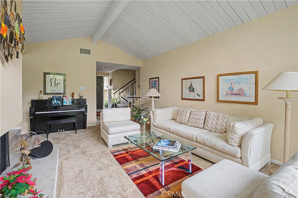 22671 Town Crier Road Calabasas, CA 91302 - Photo 27 of 35 a living room with furniture and a piano