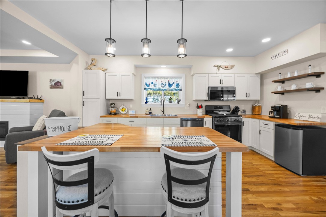 4581 Holley Byron Road Holley, NY 14470 - Photo 17 of 50 Natural finish butcher block countertops
