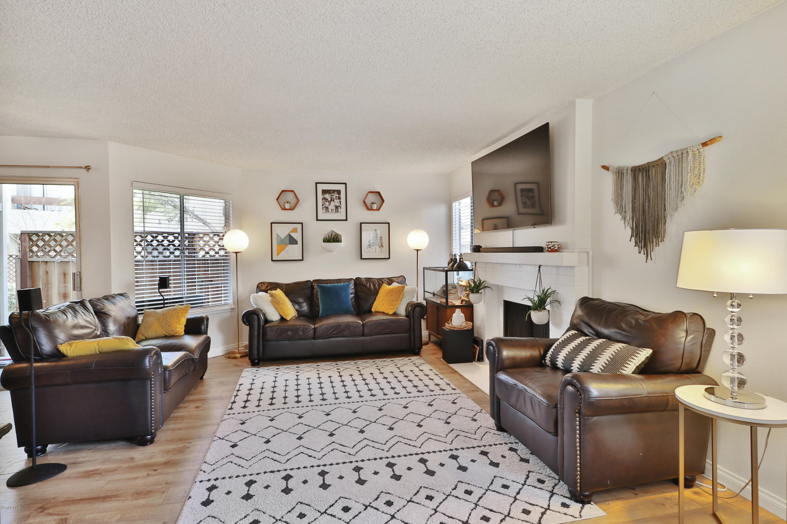1778 Sinaloa Road, Unit 198 Simi Valley, CA 93065 - Photo 1 of 25 a living room with furniture and a flat screen tv