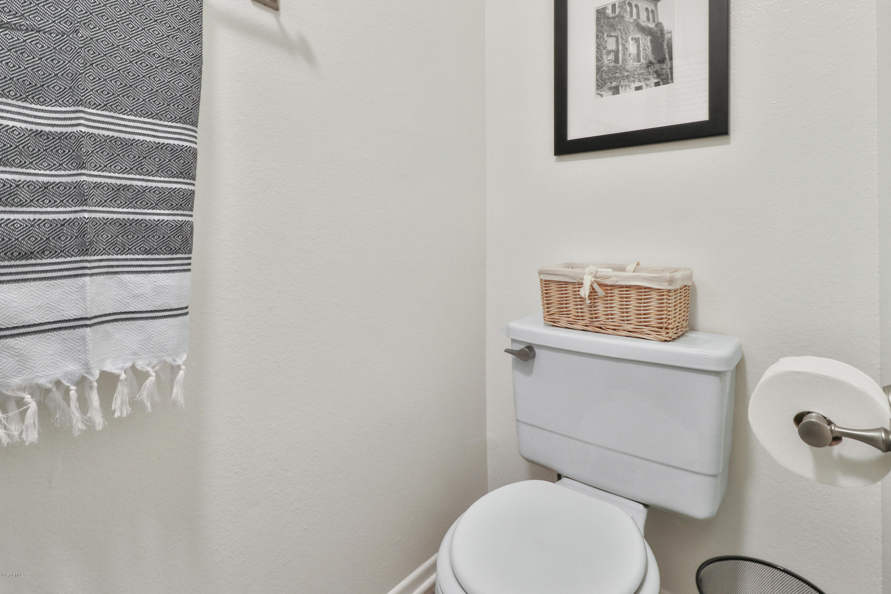 1778 Sinaloa Road, Unit 198 Simi Valley, CA 93065 - Photo 21 of 25 a bathroom with a toilet and a sink