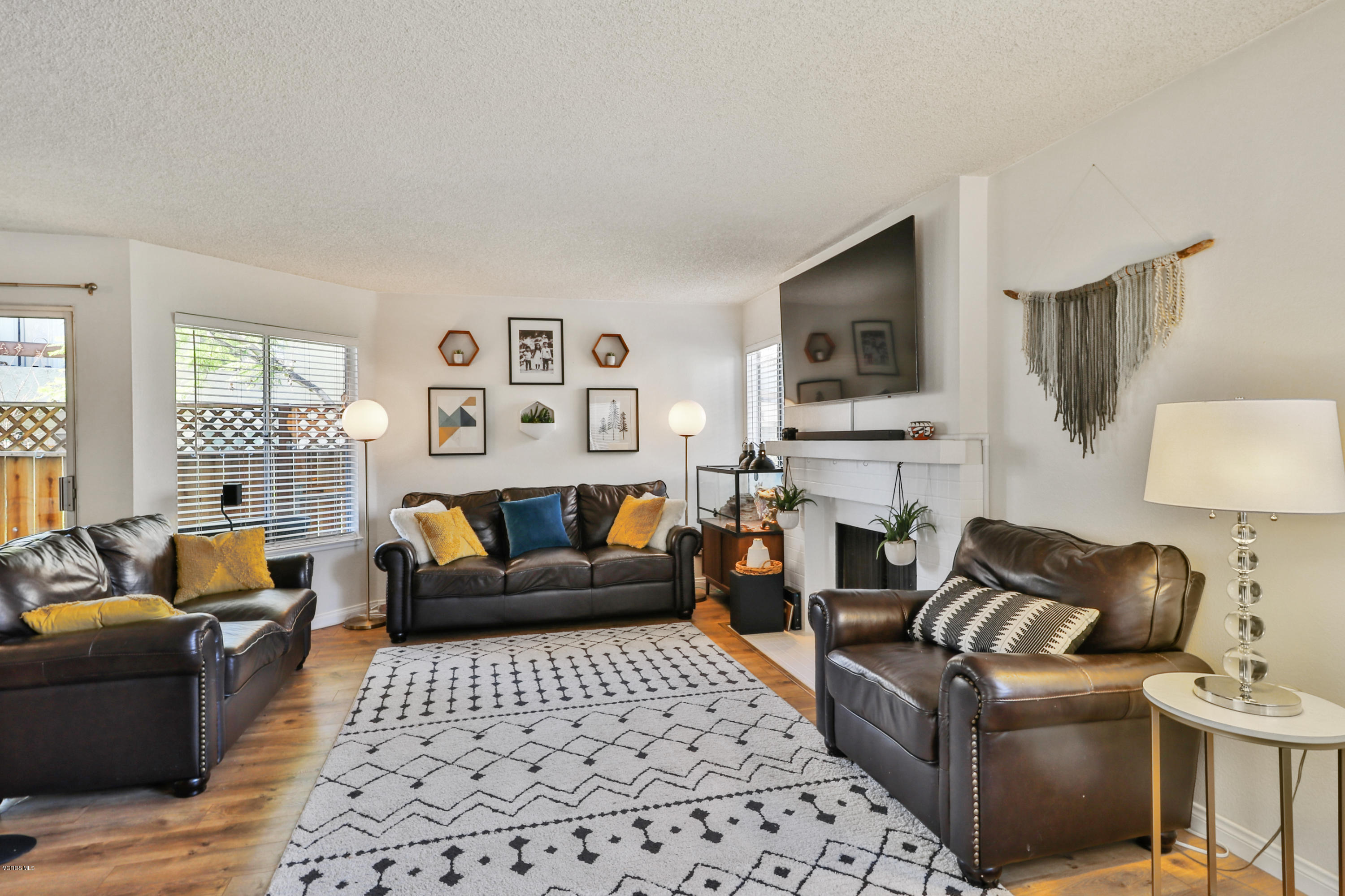 1778 Sinaloa Road, Unit 198 Simi Valley, CA 93065 - Photo 4 of 25 a living room with furniture and a flat screen tv