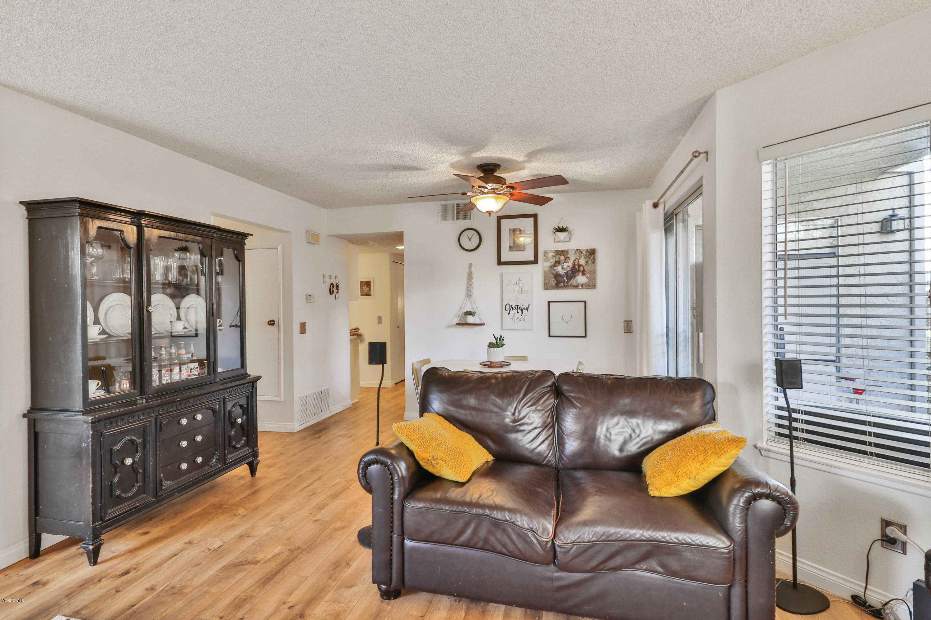 1778 Sinaloa Road, Unit 198 Simi Valley, CA 93065 - Photo 5 of 25 a living room with furniture and wooden floor