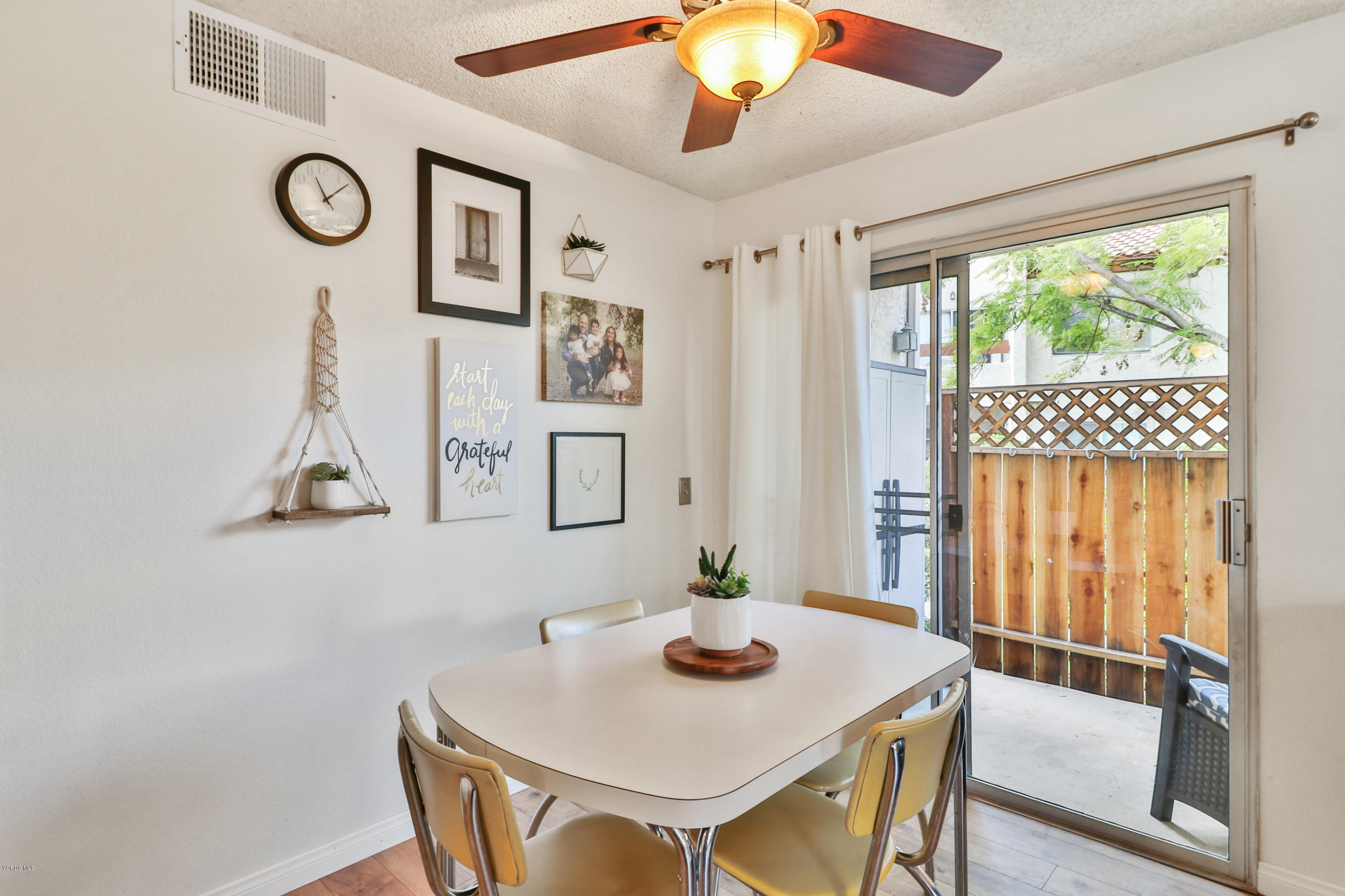 1778 Sinaloa Road, Unit 198 Simi Valley, CA 93065 - Photo 6 of 25 a view of a dining room with furniture window and wooden floor