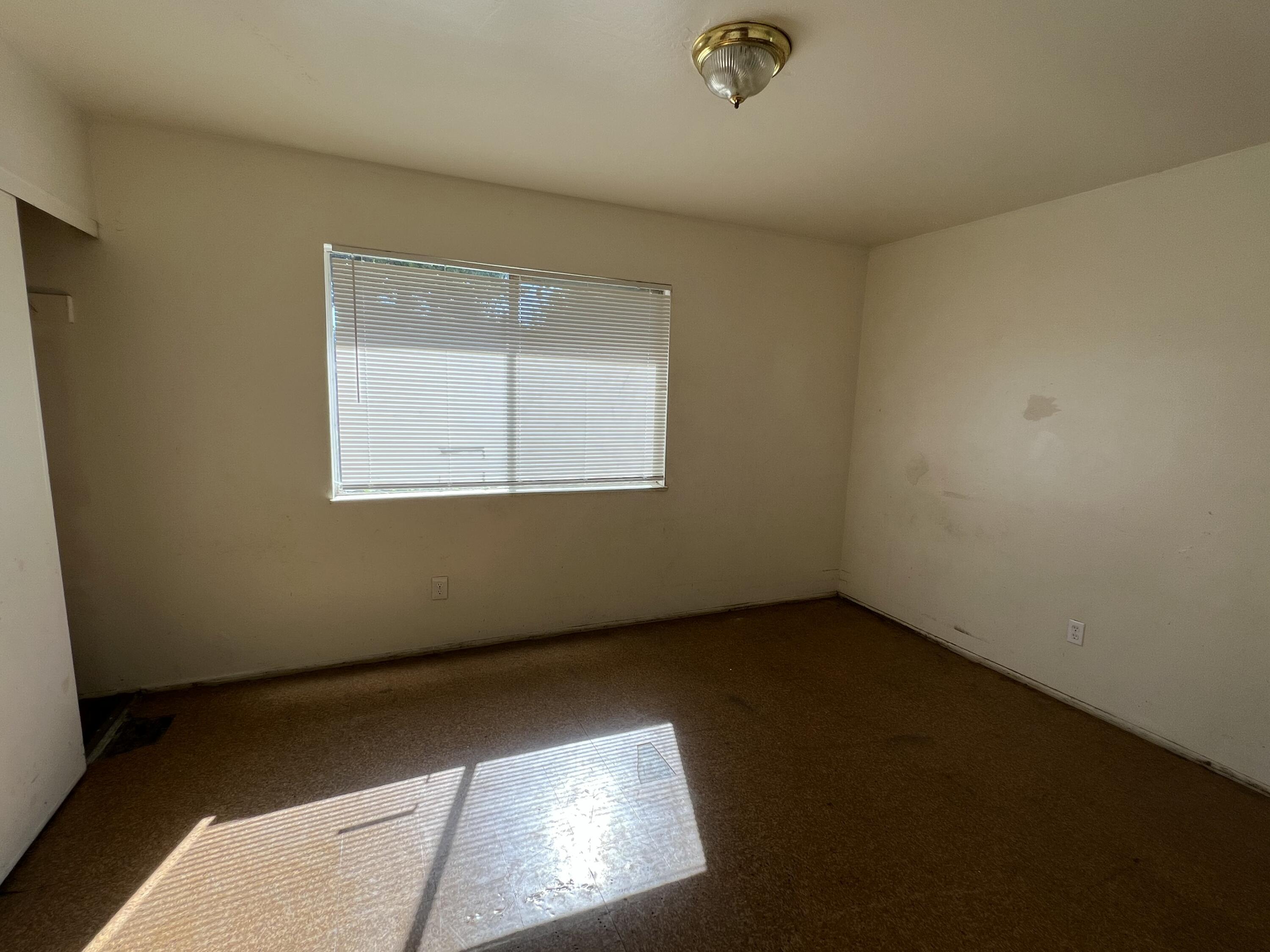 309 V Street Lompoc, CA 93436 - Photo 13 of 24 an empty room with a window