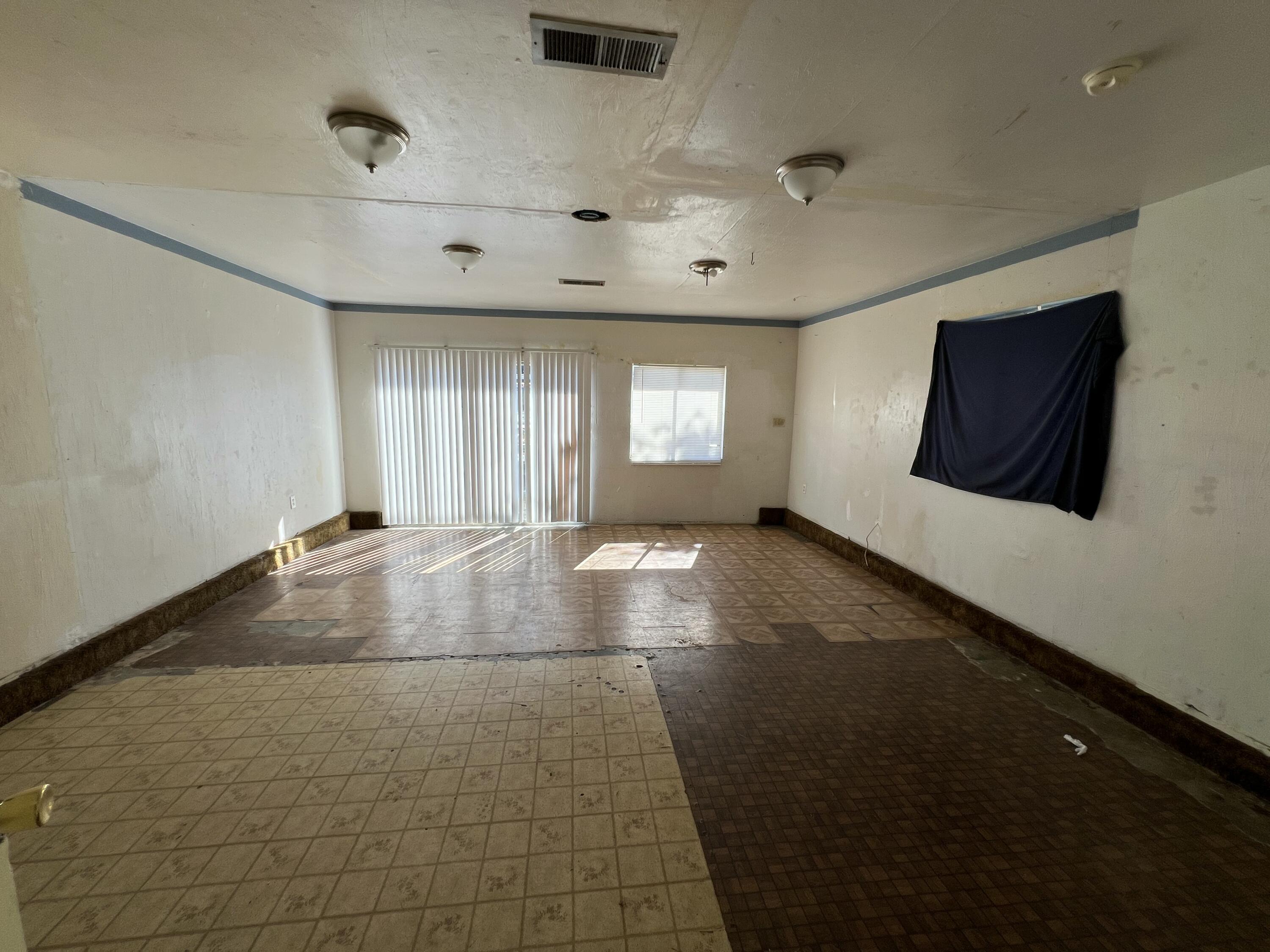 309 V Street Lompoc, CA 93436 - Photo 20 of 24 a view of room with window and hardwood floor