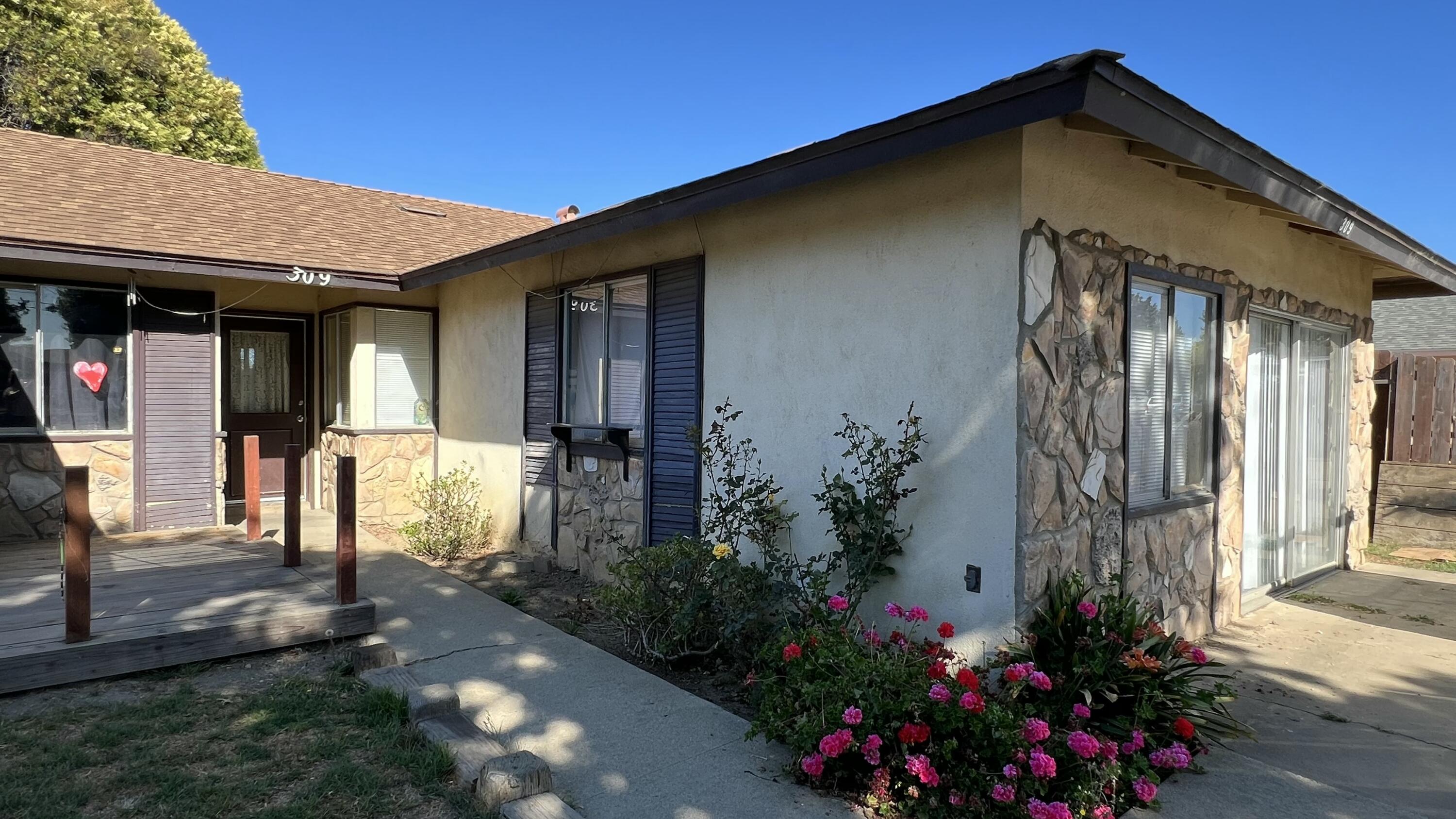 309 V Street Lompoc, CA 93436 - Photo 2 of 24 a front view of a house