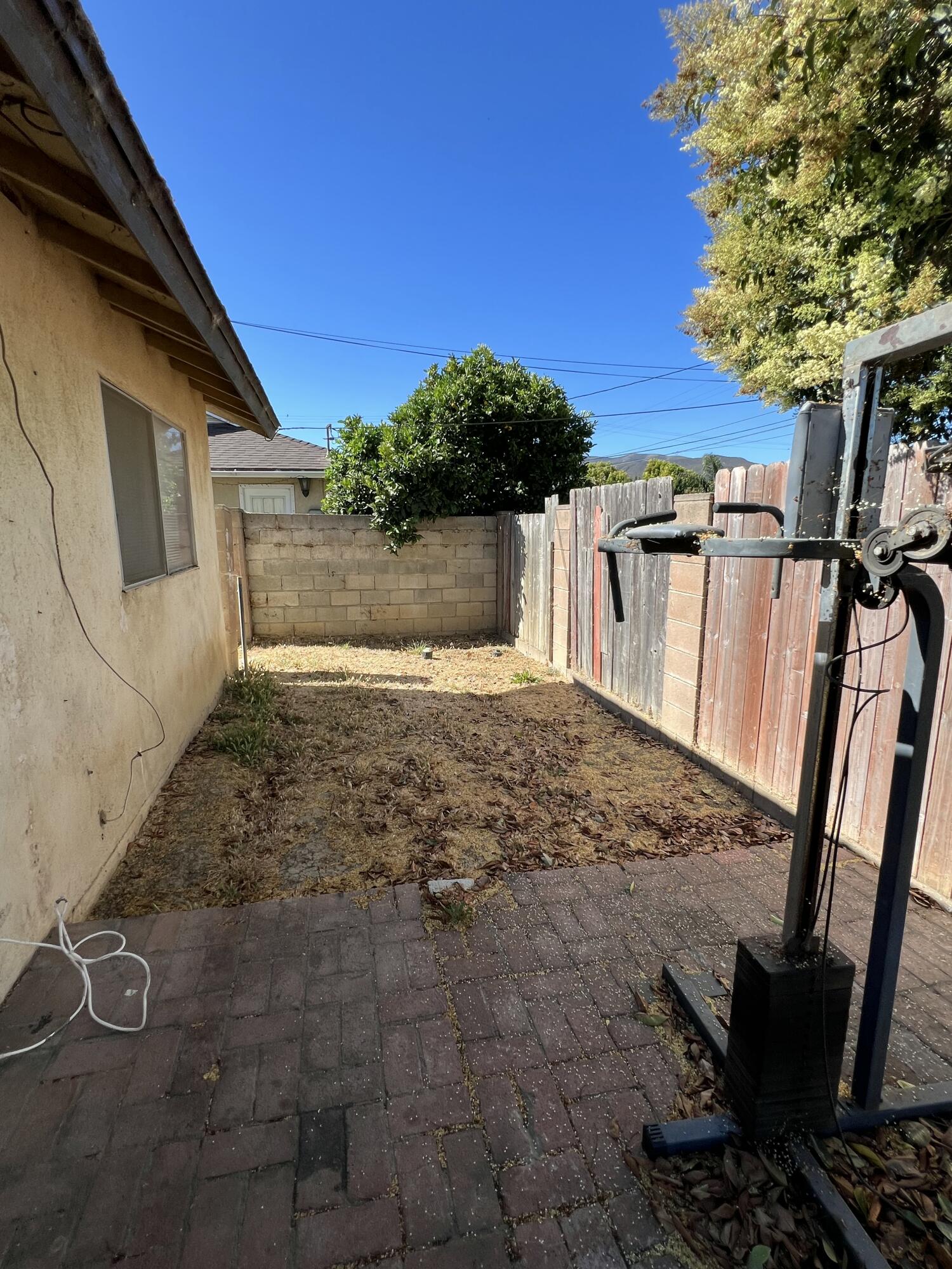 309 V Street Lompoc, CA 93436 - Photo 23 of 24 a view of a backyard of the house