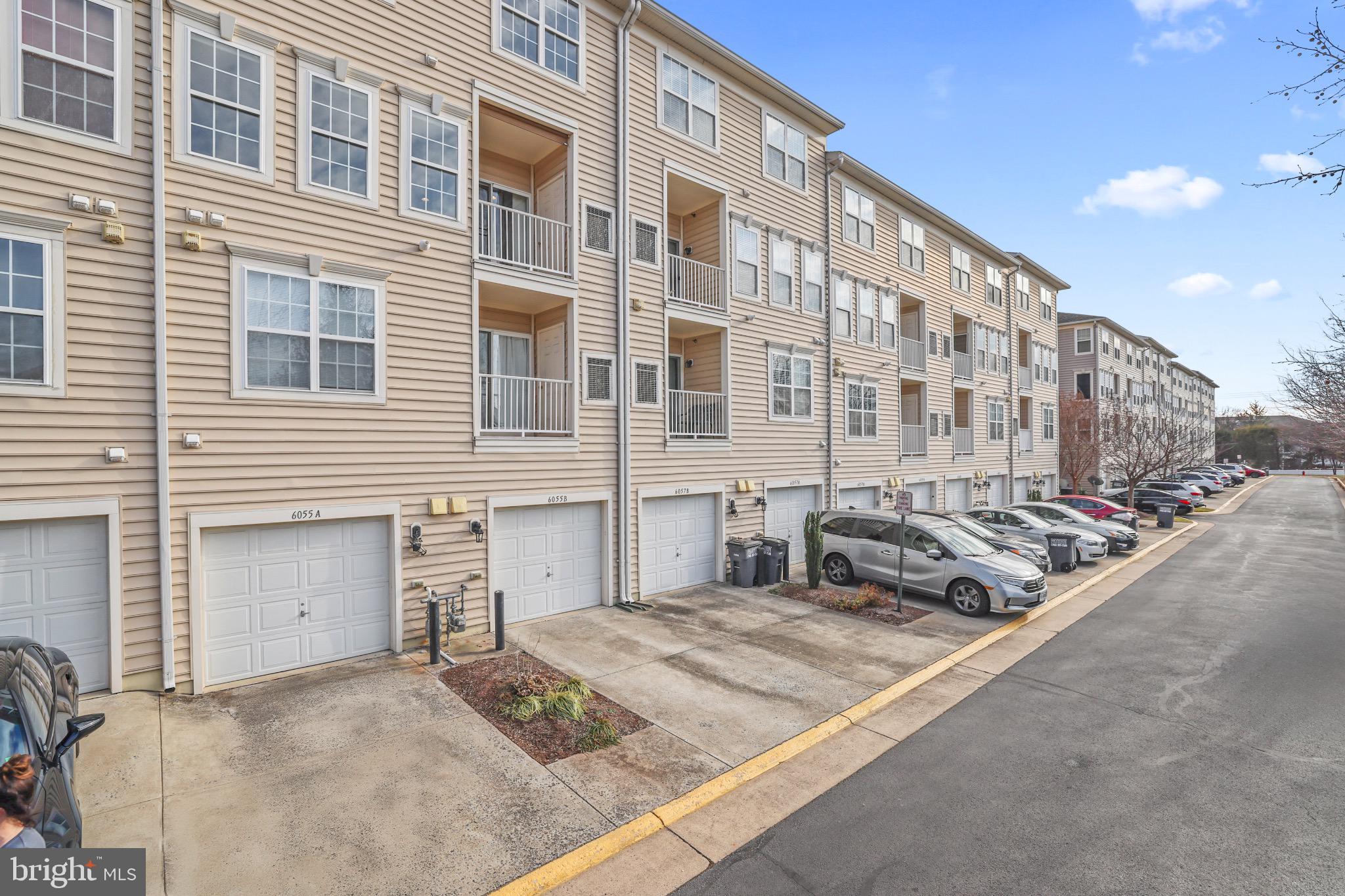 6055 Wicker Lane, Unit 128 Centreville, VA 20121 - Photo 32 of 36 a view of a large building