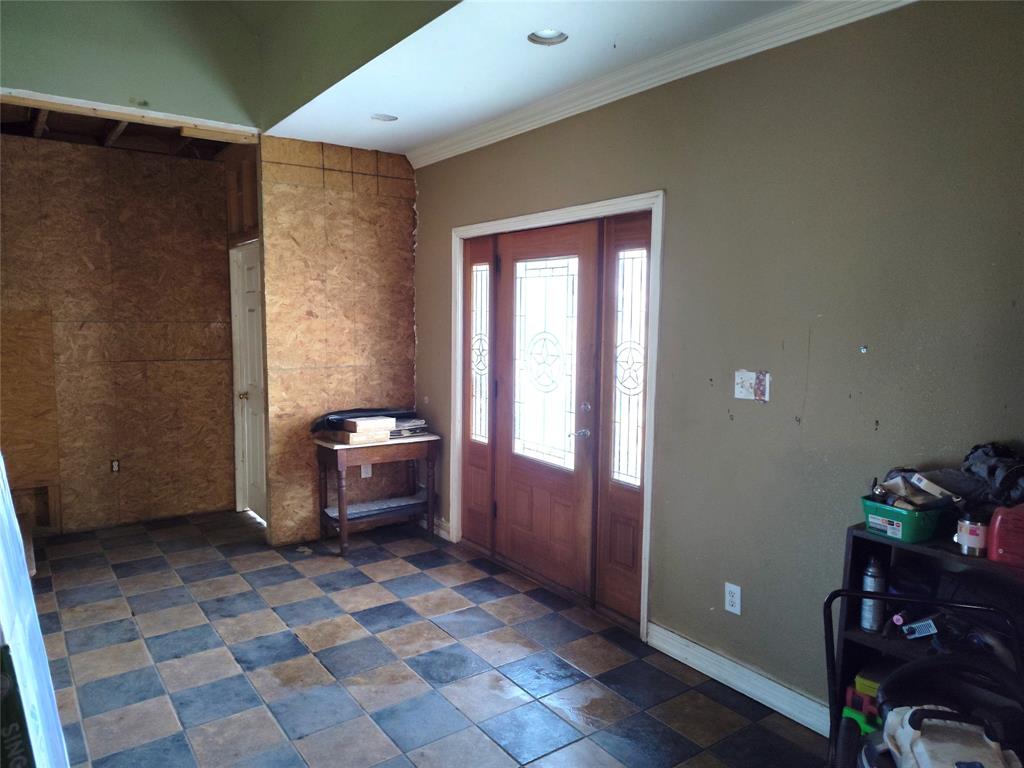 5077 East Line Road Whitewright, TX 75491 - Photo 6 of 16 a bathroom with a bathtub and a shower