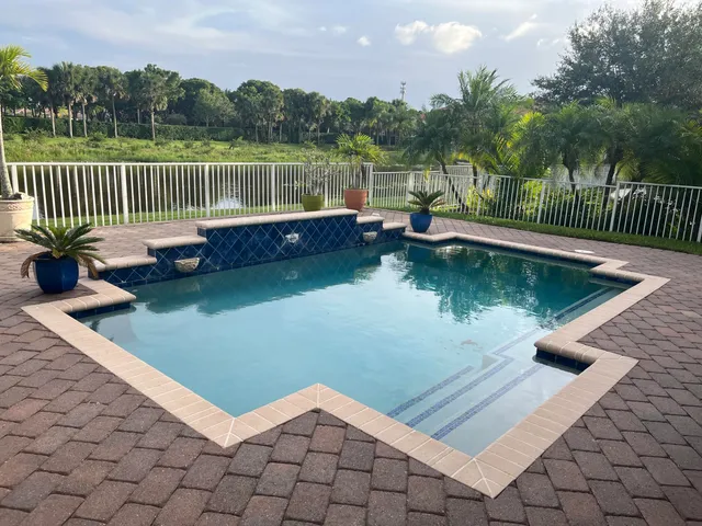 a view of a backyard with a lake
