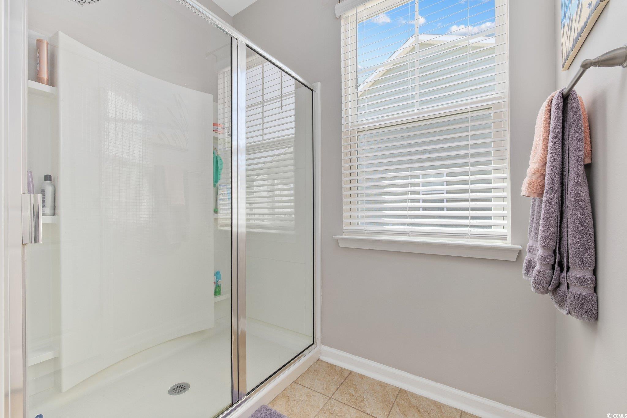 6009 Ranch View Drive Myrtle Beach, SC 29588 - Photo 20 of 40 Full bathroom featuring tile patterned floors, baseboards, and a shower stall