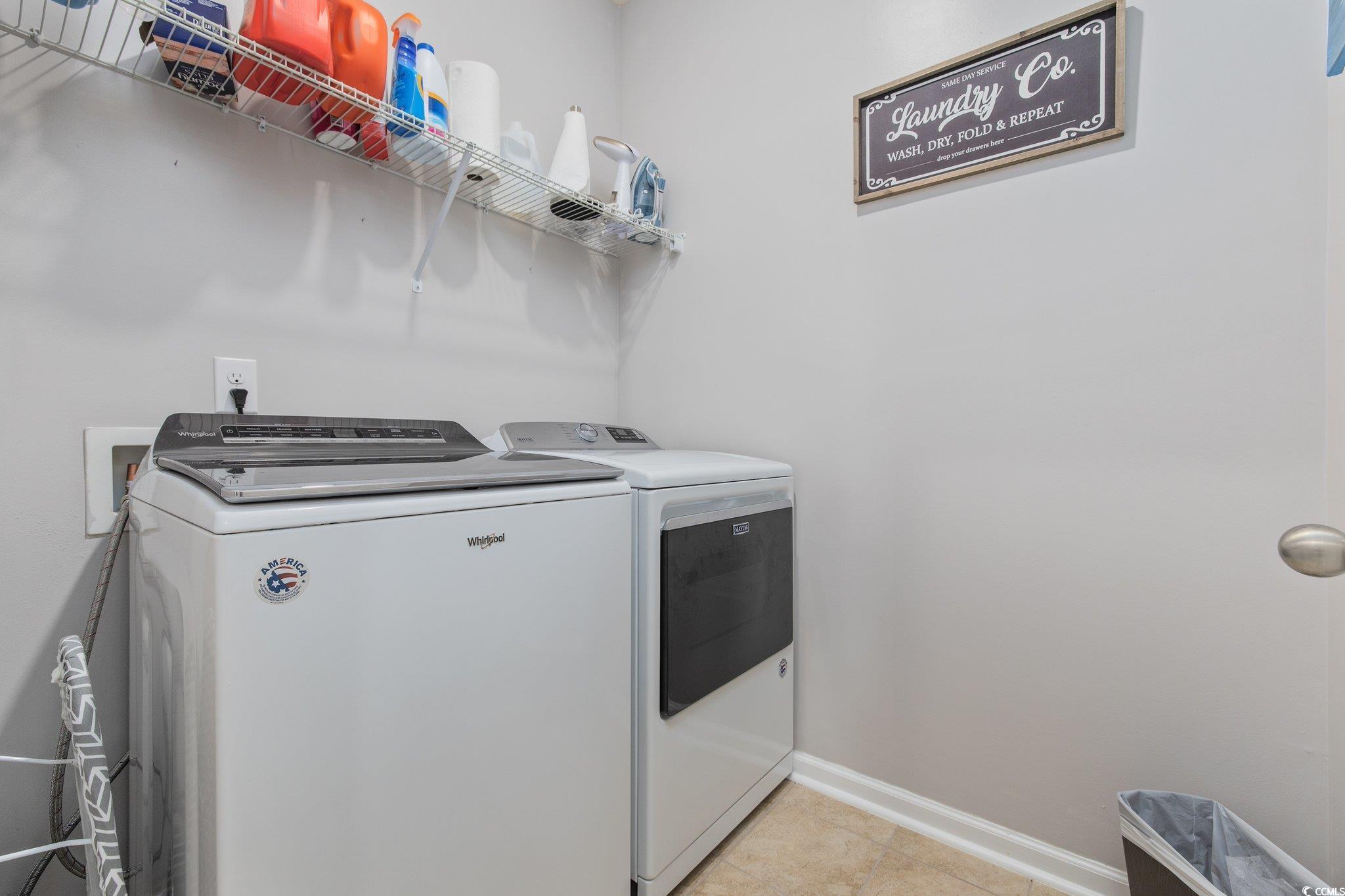6009 Ranch View Drive Myrtle Beach, SC 29588 - Photo 24 of 40 Washroom featuring laundry area, light tile patterned floors, baseboards, and washing machine and clothes dryer