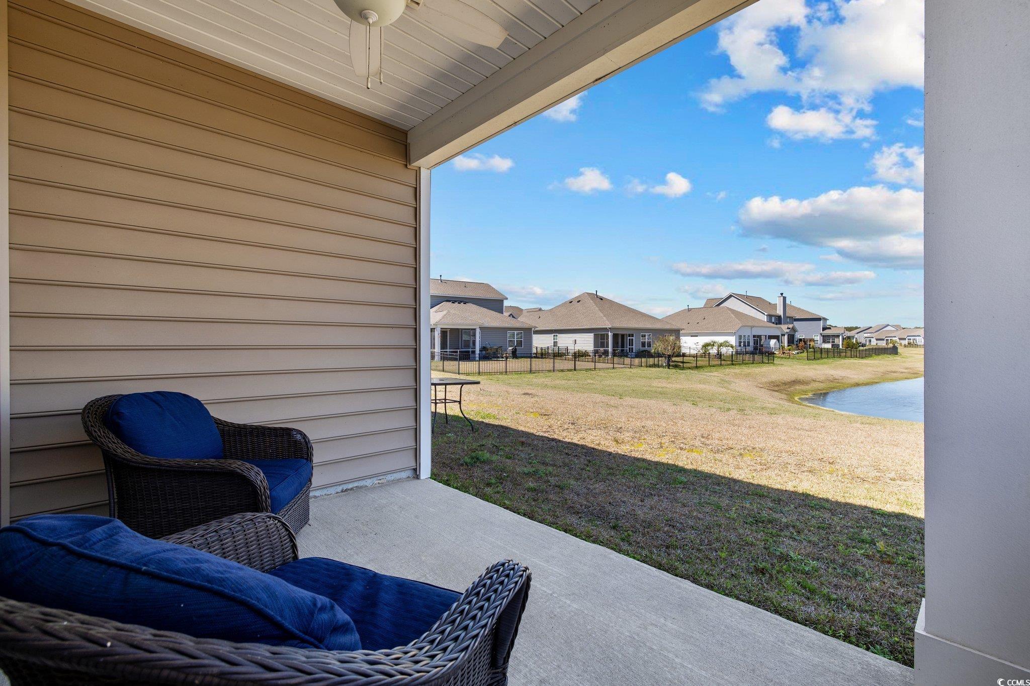 6009 Ranch View Drive Myrtle Beach, SC 29588 - Photo 29 of 40 View of patio / terrace featuring fence, a residential view, and ceiling fan