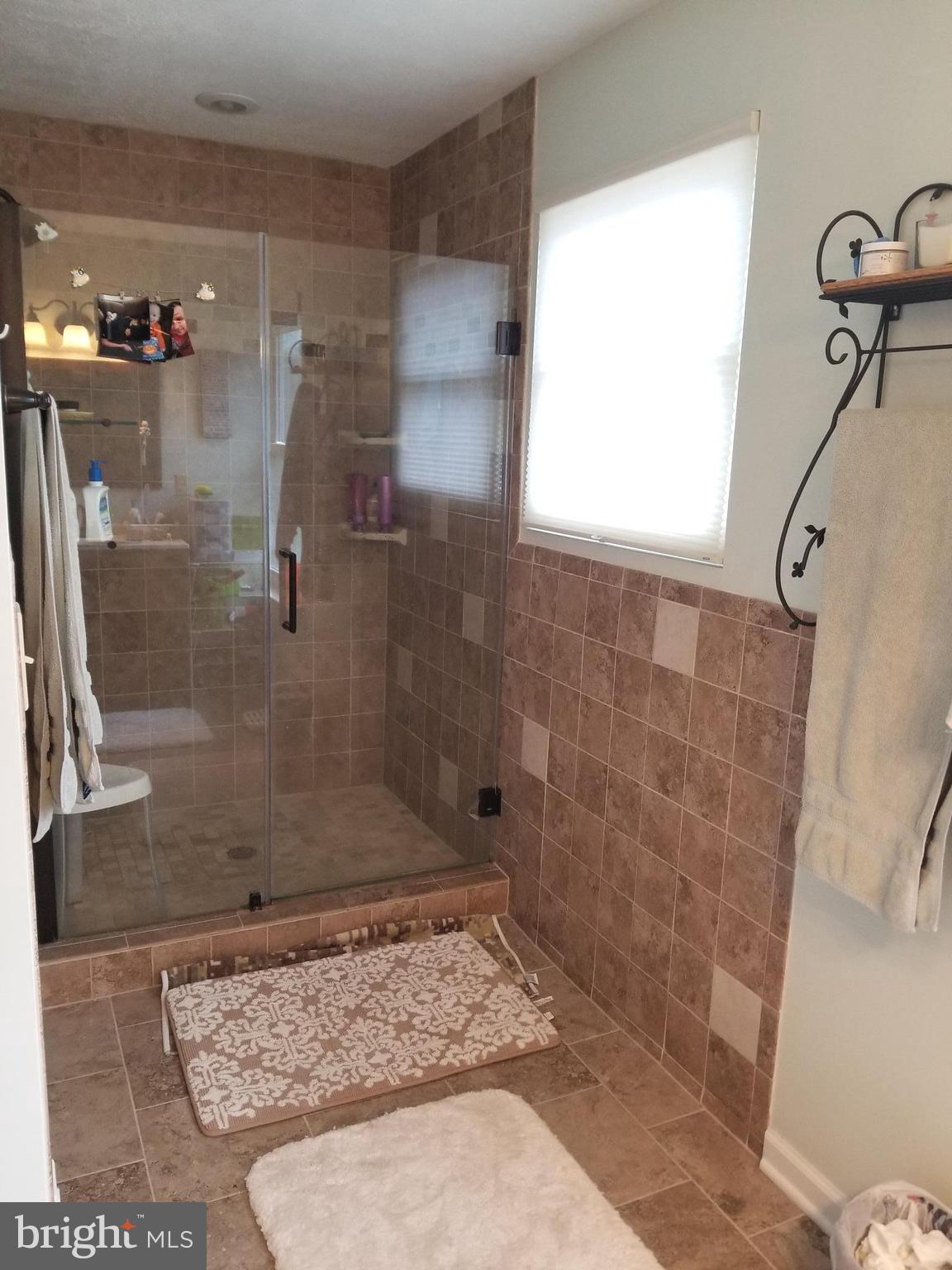 44 Buck Road Stafford, VA 22556 - Photo 13 of 30 a bathroom with a shower