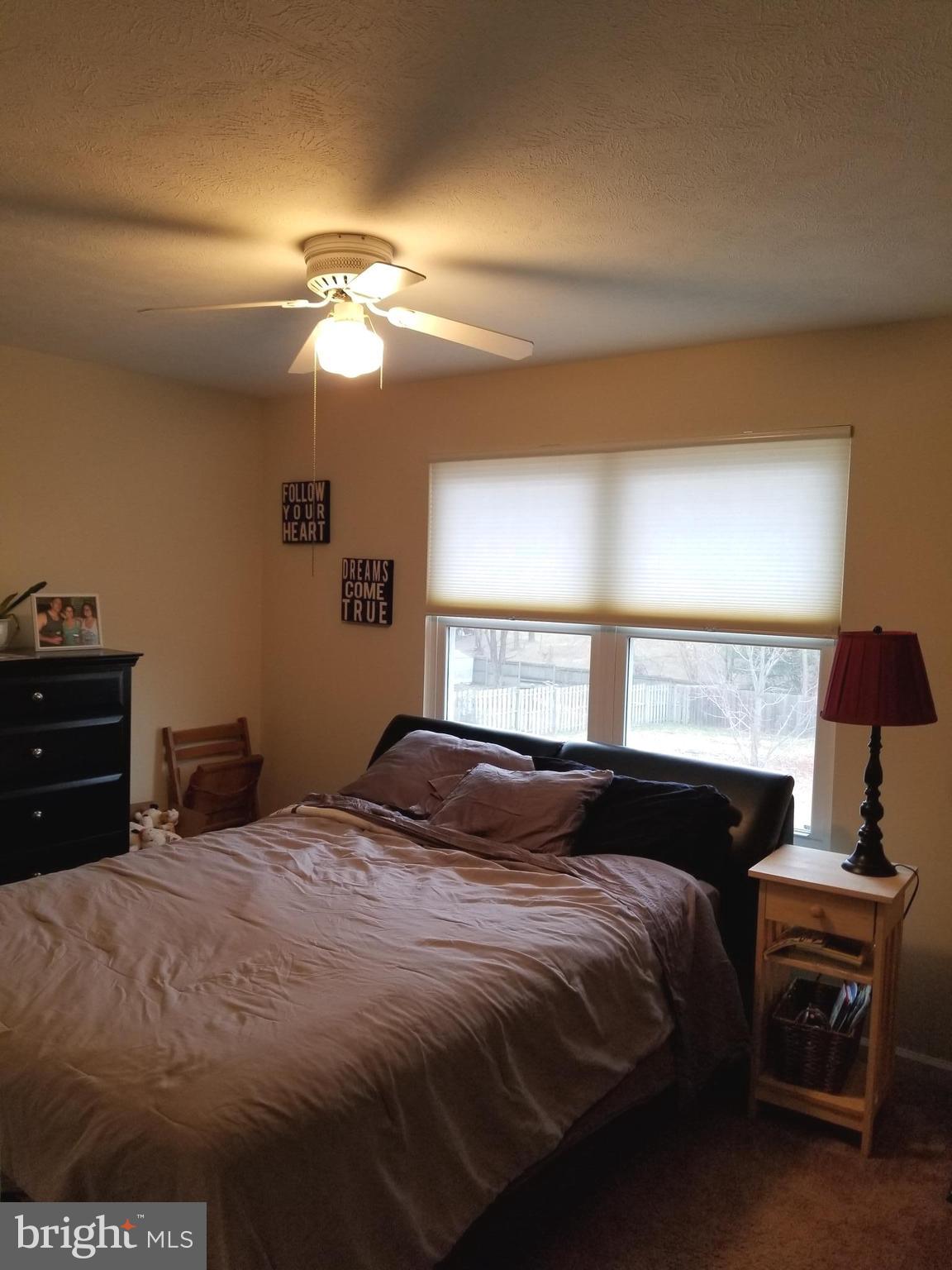44 Buck Road Stafford, VA 22556 - Photo 15 of 30 a bedroom with a bed and a window