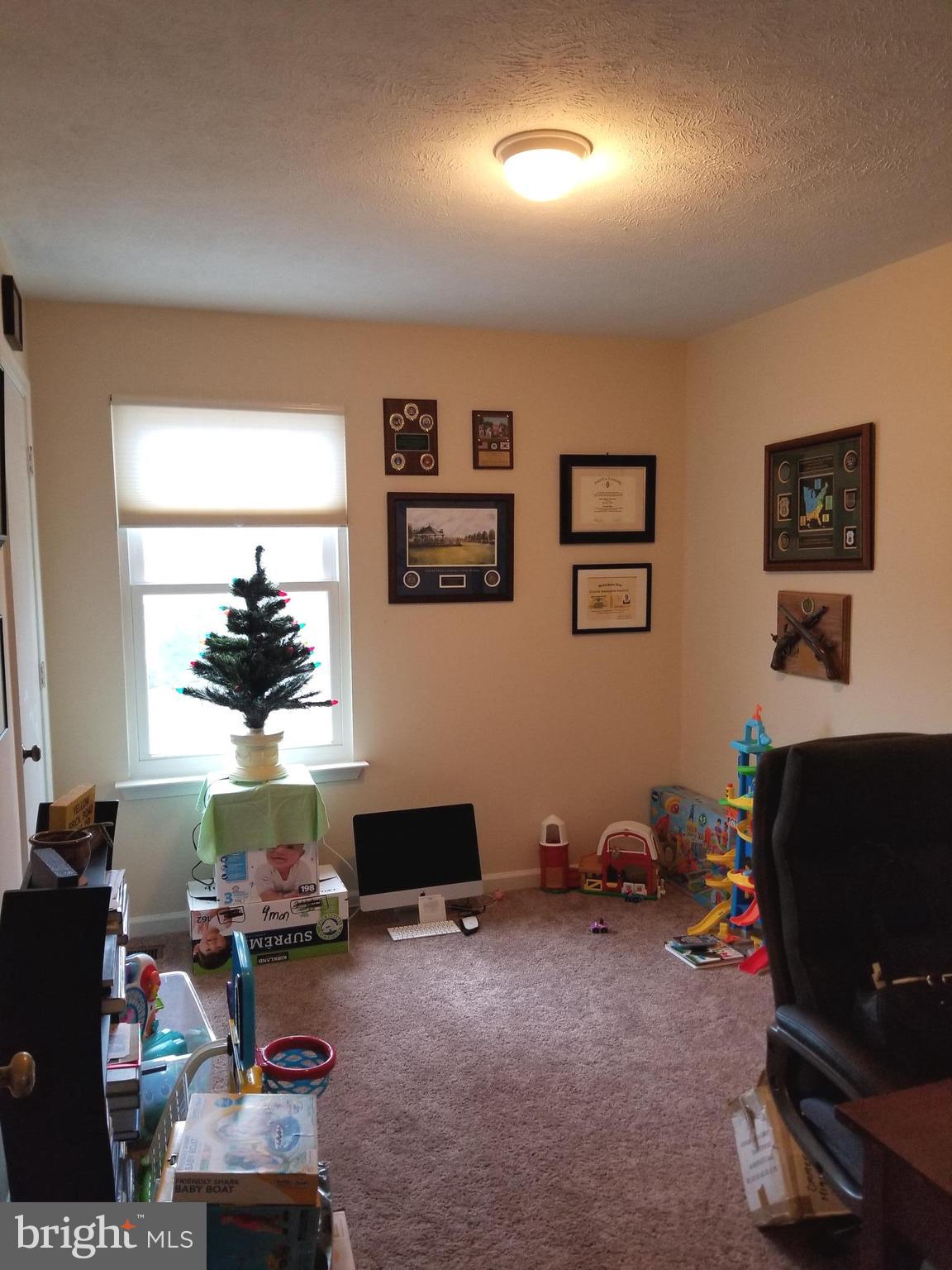 44 Buck Road Stafford, VA 22556 - Photo 19 of 30 a view of a livingroom with workspace and a window