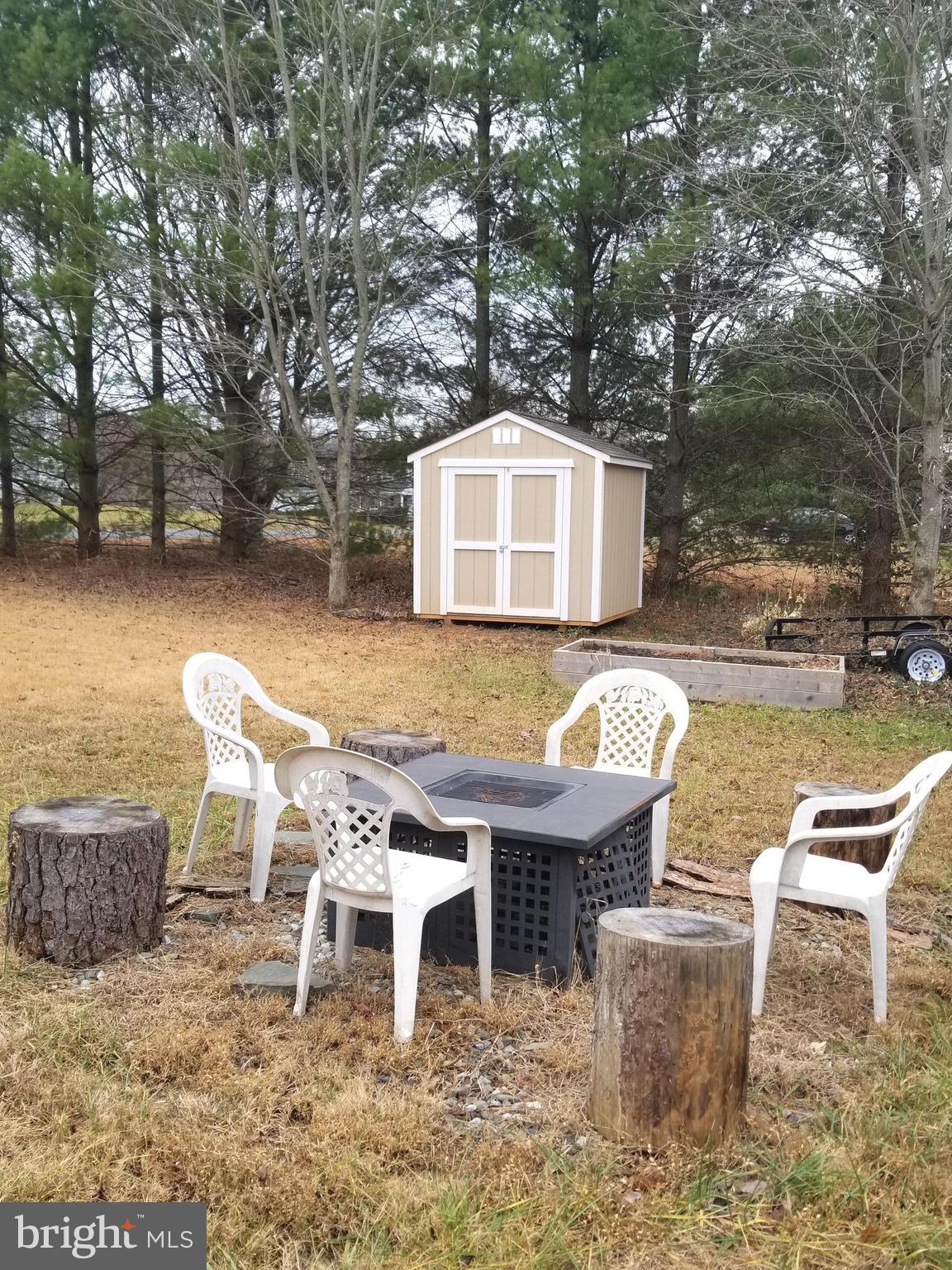 44 Buck Road Stafford, VA 22556 - Photo 27 of 30 a view of a chairs and table in backyard