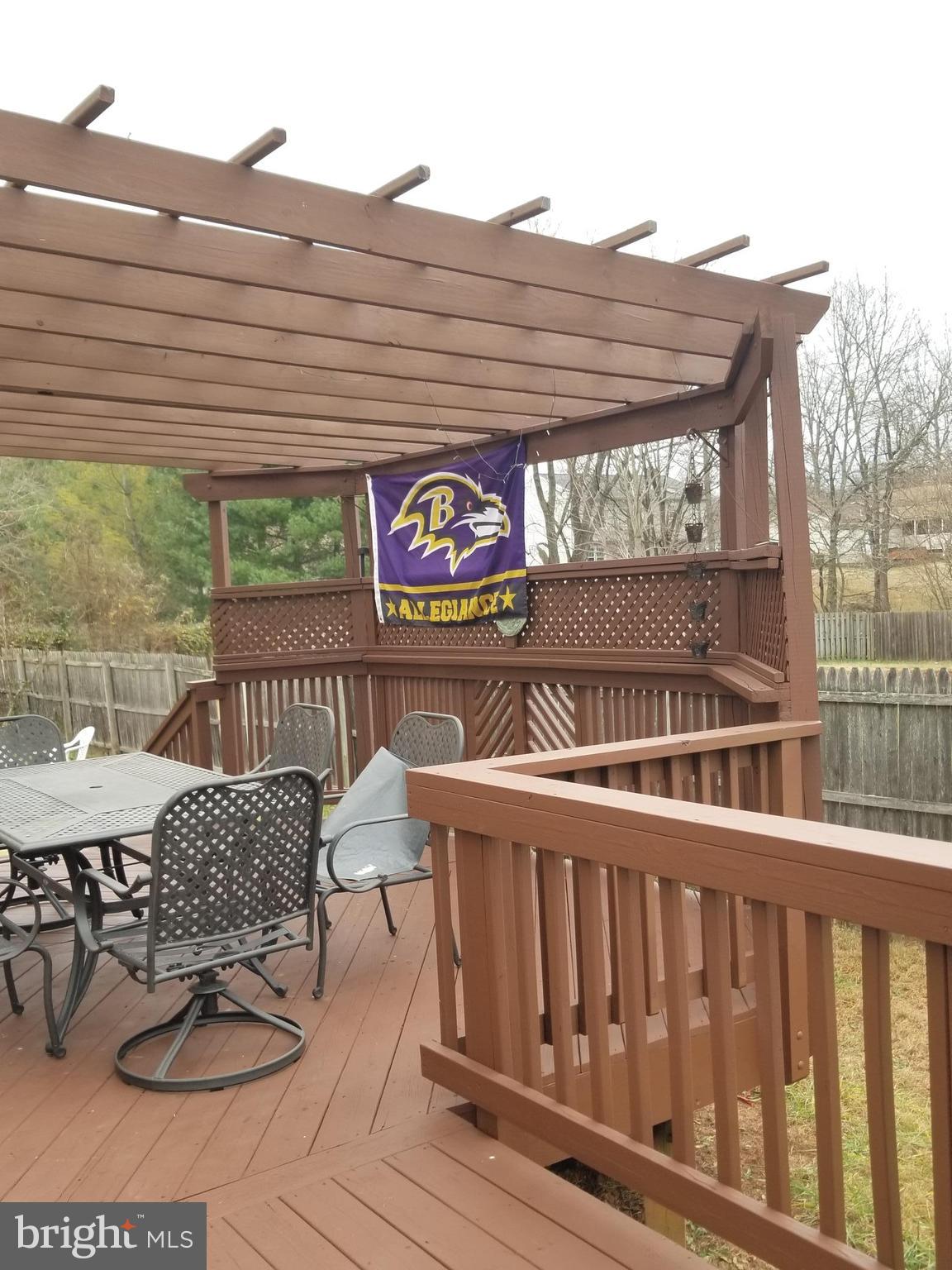 44 Buck Road Stafford, VA 22556 - Photo 29 of 30 a view of a chairs and table on the deck
