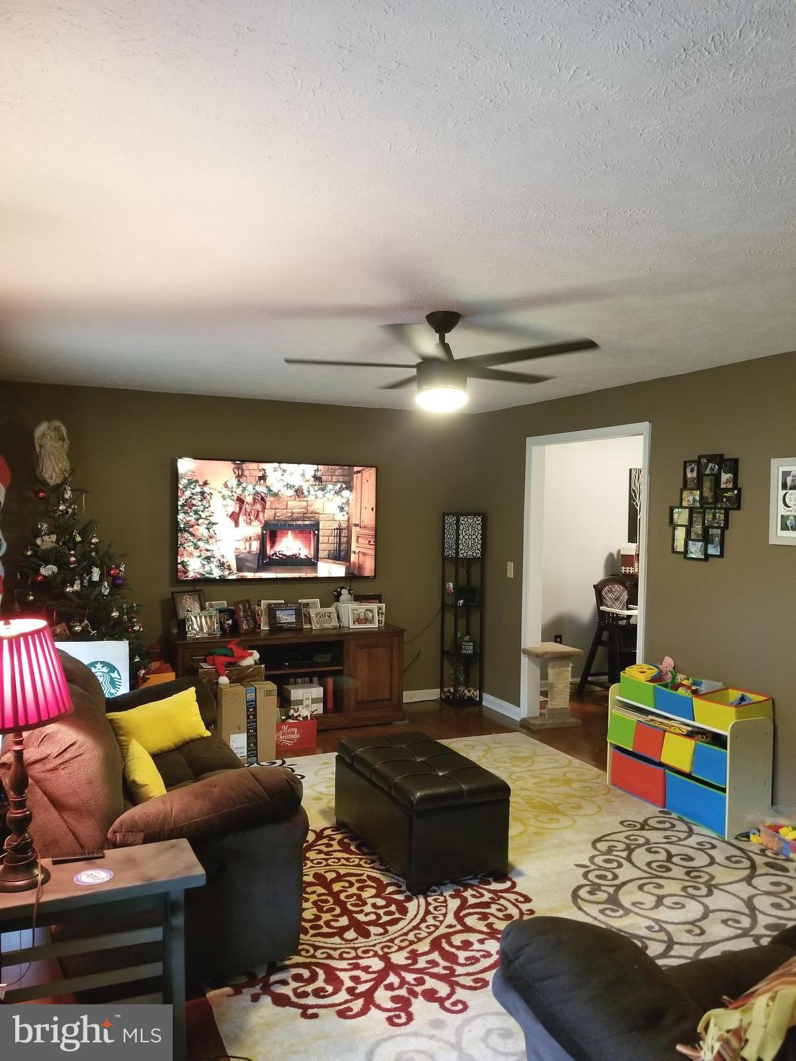 44 Buck Road Stafford, VA 22556 - Photo 4 of 30 a living room with furniture and a flat screen tv