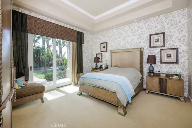 a living room with fireplace furniture and a flat screen tv
