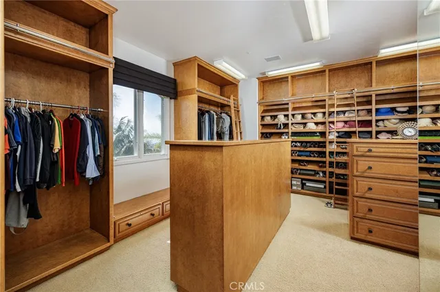 an aerial view of a house with a big yard