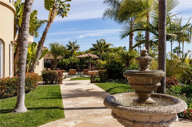 a living room with a floor to ceiling window and a floor to ceiling window