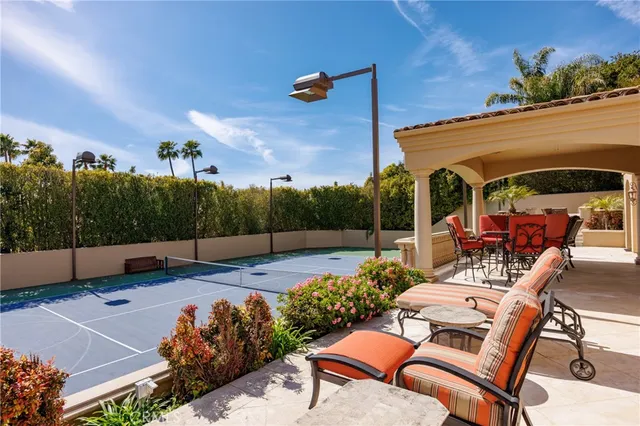a living room with furniture window and flat screen tv