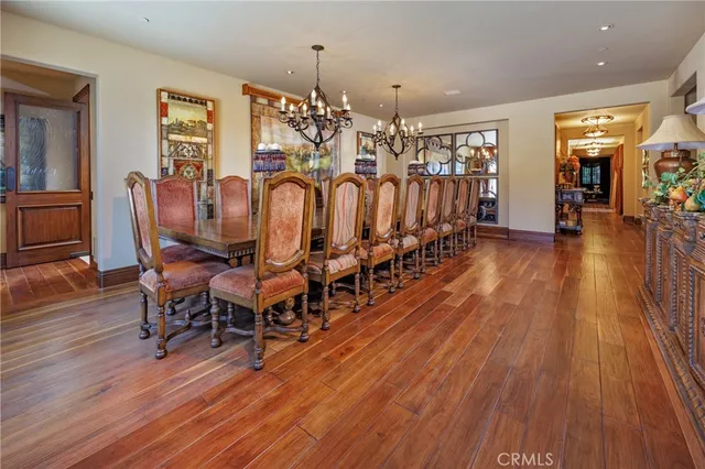 a bedroom with a large bed and a large window