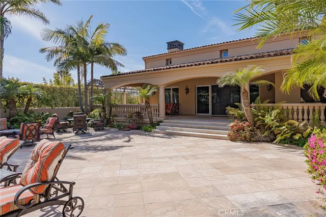 an aerial view of a houses with outdoor space