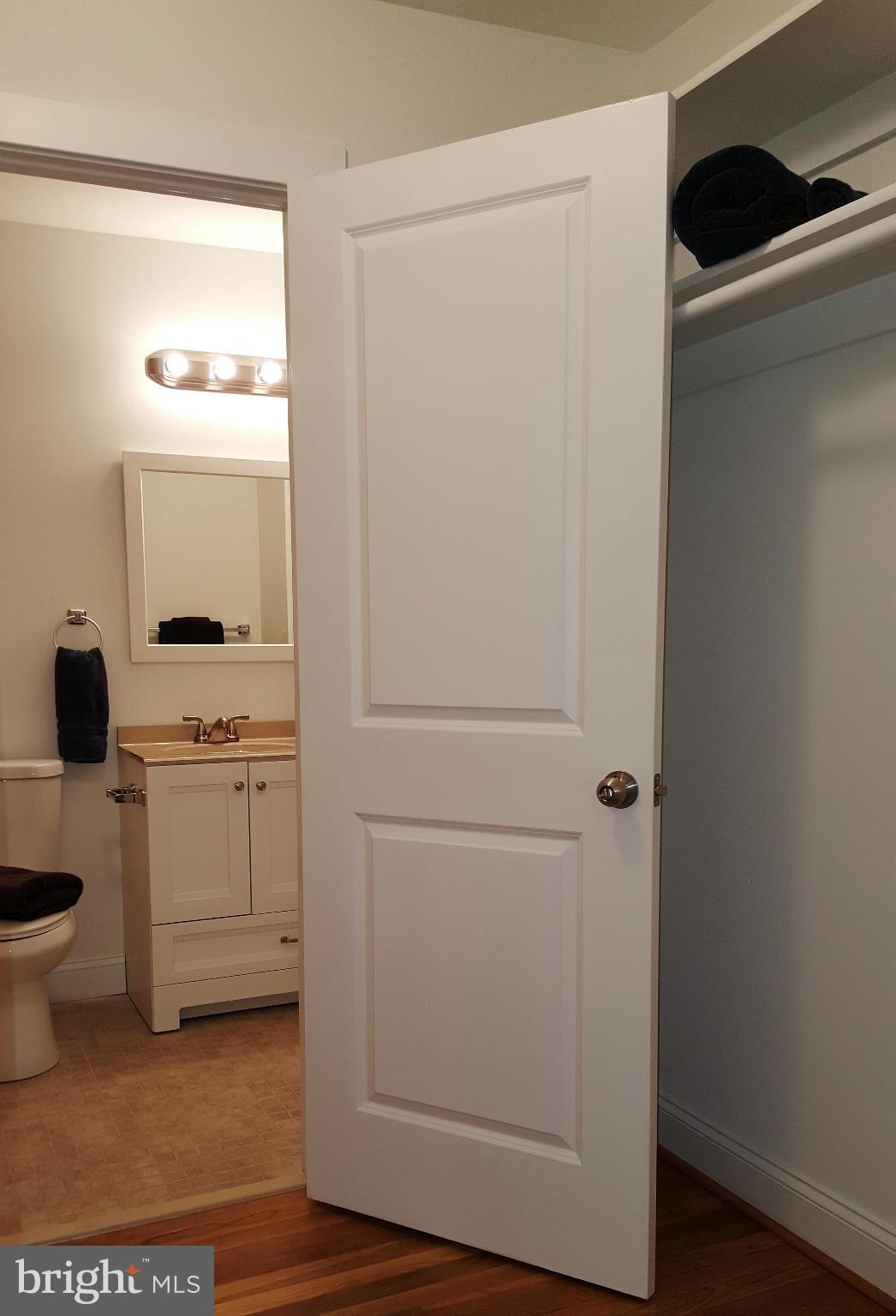 12101 Berry Street Silver Spring, MD 20902 - Photo 6 of 27 a bathroom with a sink and a mirror