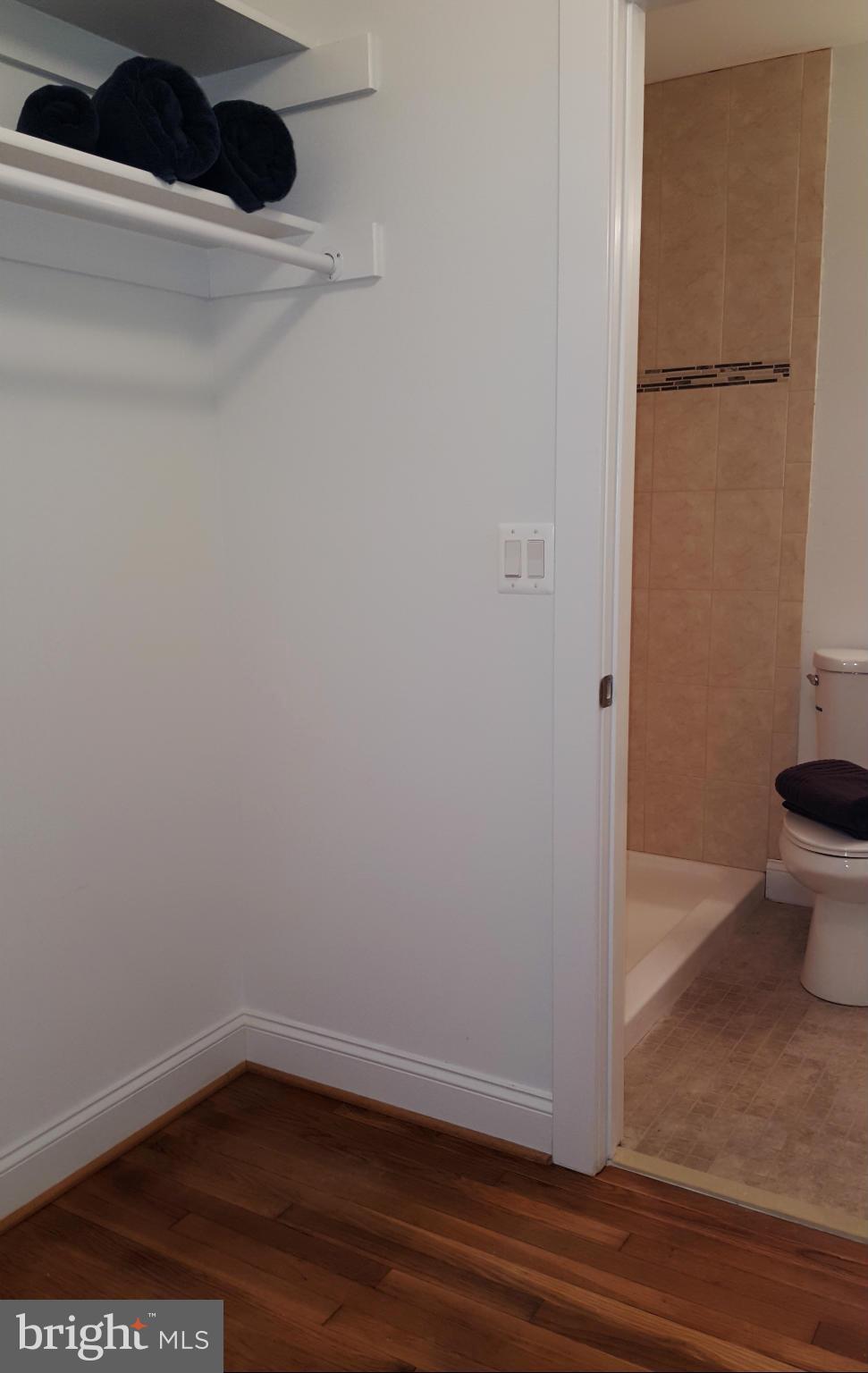 12101 Berry Street Silver Spring, MD 20902 - Photo 7 of 27 a view of a small space with wooden floor