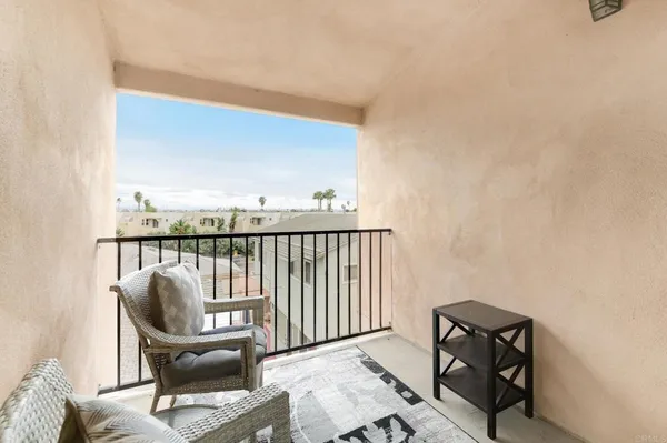 a balcony view with a couch