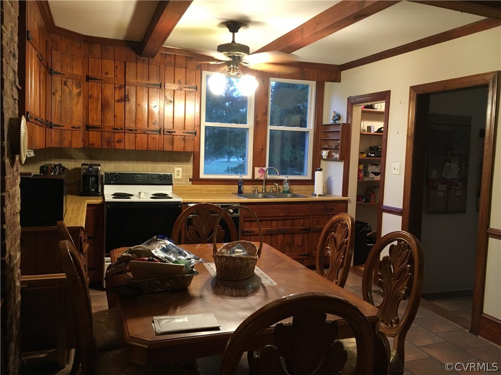 413 Bermuda Hundred Road Chester, VA 23836 - Photo 5 of 12 a kitchen with a table and chairs