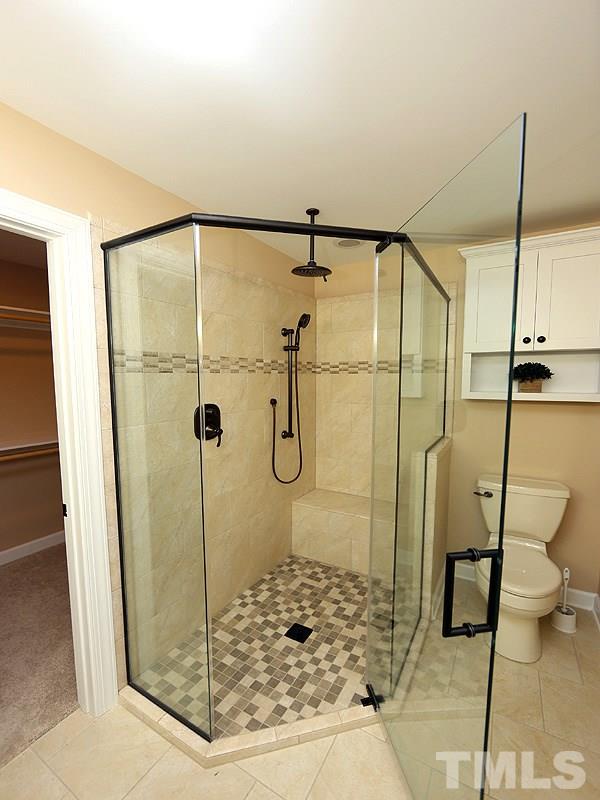 6825 Pinnacle Ridge Road Raleigh, NC 27603 - Photo 15 of 23 a bathroom with a shower