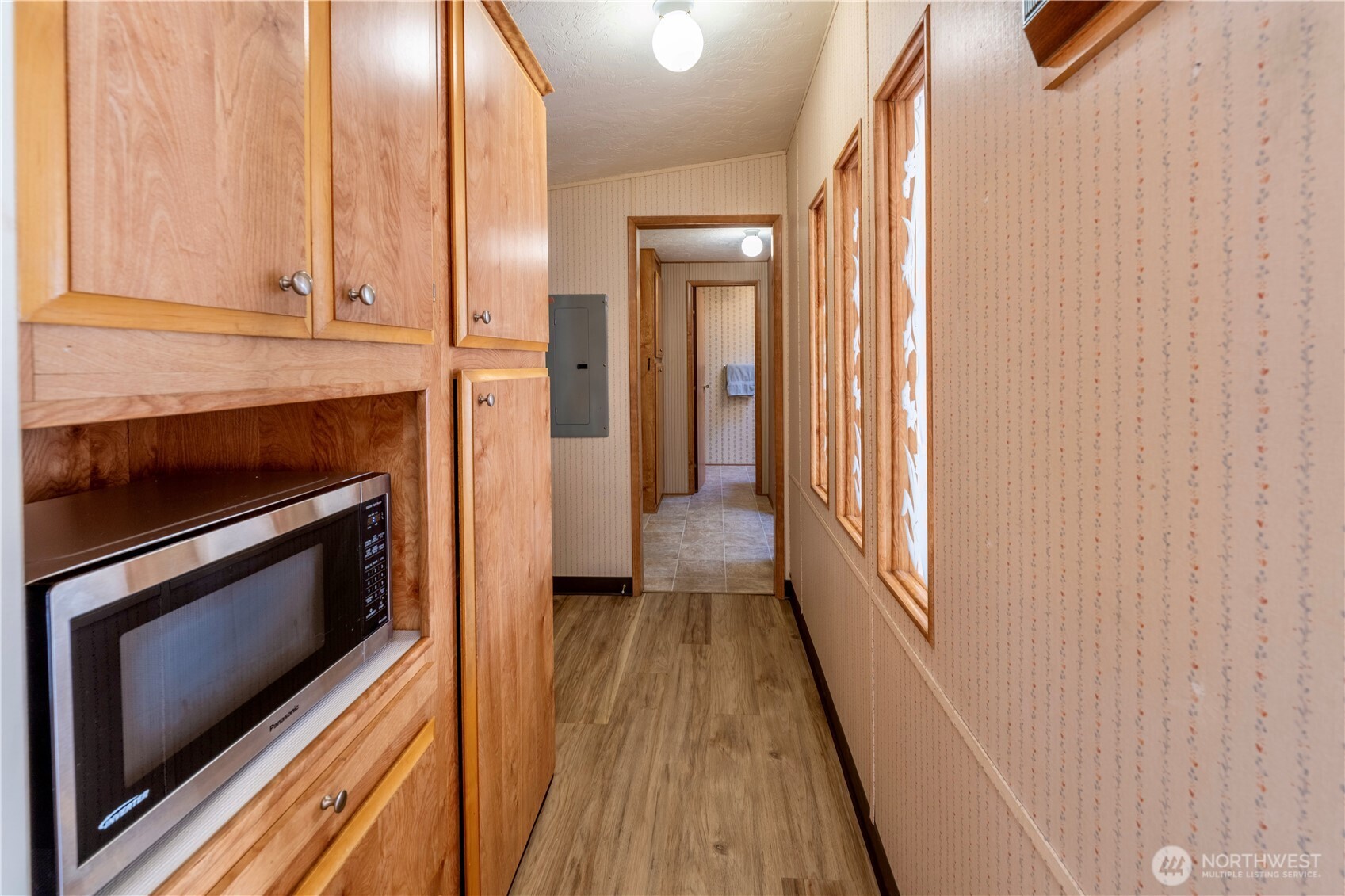 120 Fircrest Drive Sequim, WA 98382 - Photo 19 of 32 a view of a kitchen from the hallway