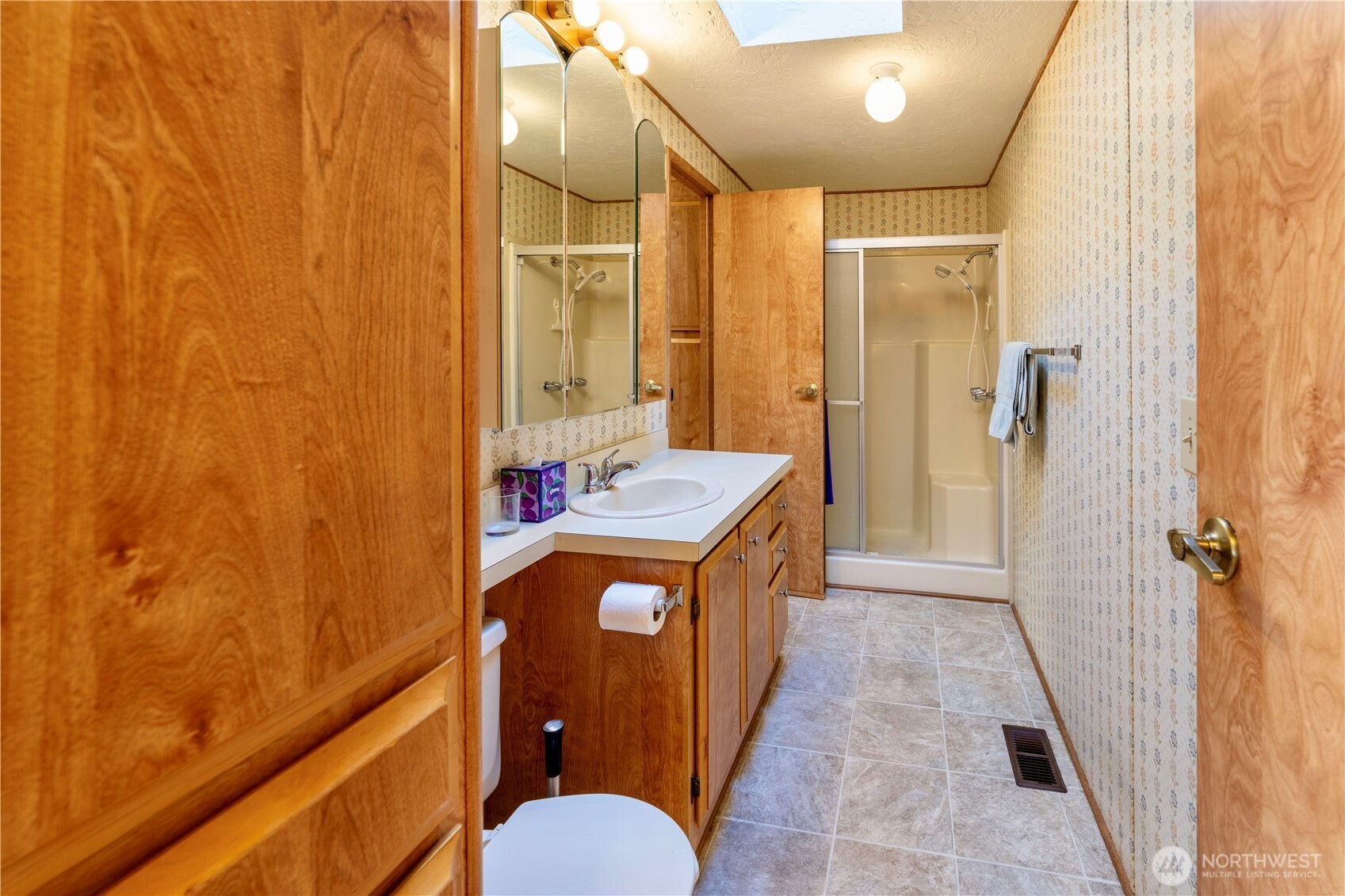 120 Fircrest Drive Sequim, WA 98382 - Photo 22 of 32 a bathroom with a sink a toilet and shower