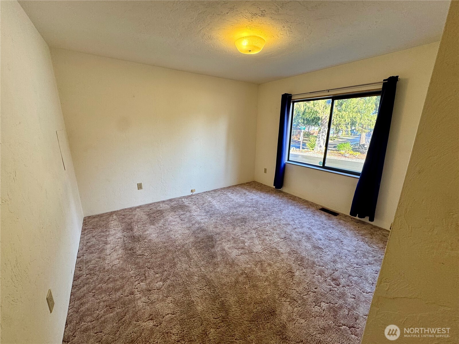 120 Fircrest Drive Sequim, WA 98382 - Photo 23 of 32 a view of an empty room and window