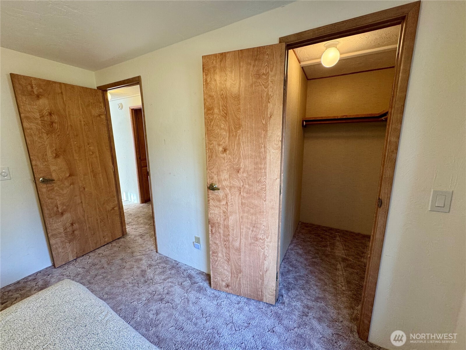 120 Fircrest Drive Sequim, WA 98382 - Photo 26 of 32 an entryway door with wooden floor and a hallway
