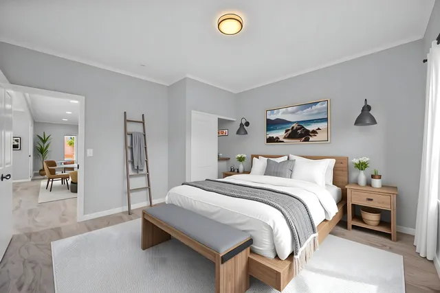 a bedroom with a bed and a desk